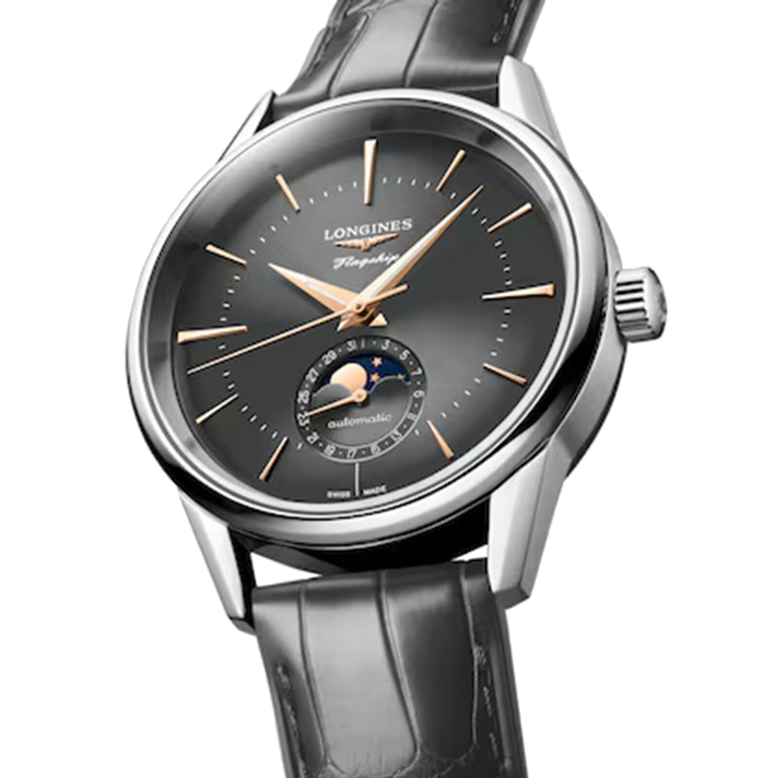 The Longines Flagship Heritage Moonphase features a black leather strap, dark dial, gold hour markers, and a moon phase-date subdial—a Swiss masterpiece from the Flagship collection.