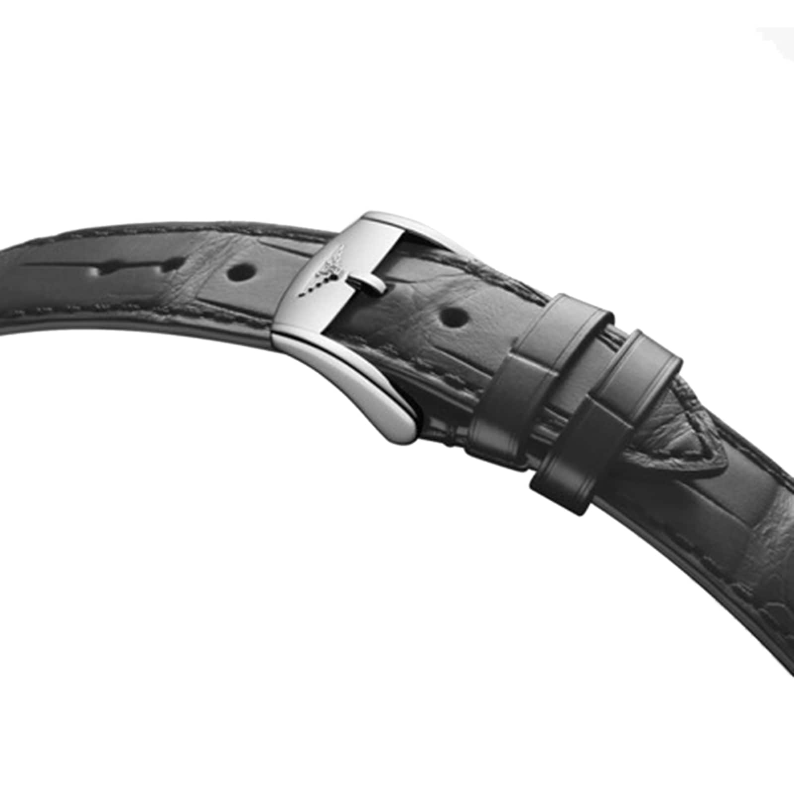 Close-up of a black leather watch strap with visible stitching and a metal buckle, designed for the Longines Flagship Heritage Moonphase.