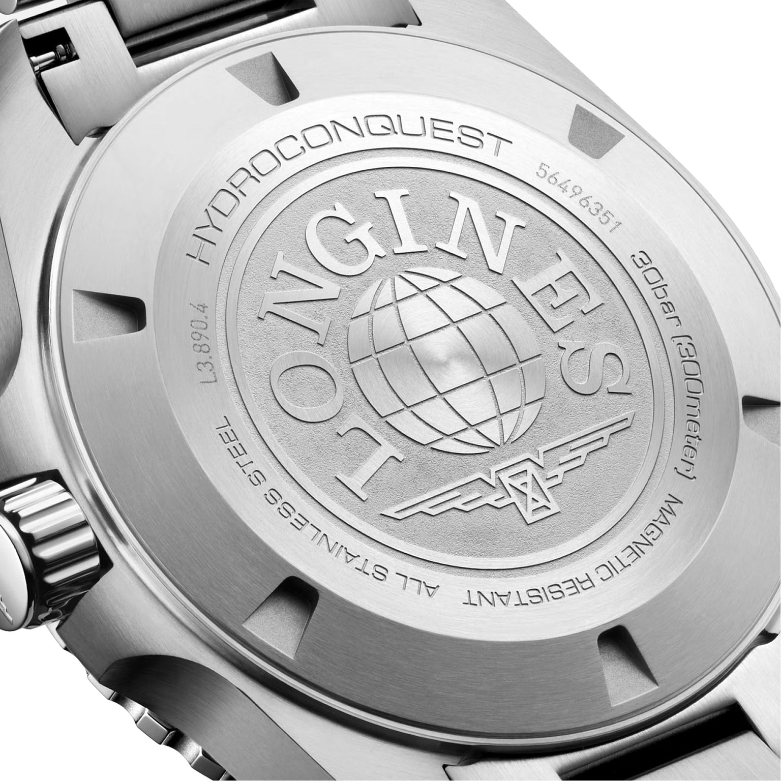 Close-up of the stainless steel case back of the Longines Hydroconquest watch, displaying engraved branding, model details, water resistance info, and reference to the Longines GMT calibre.