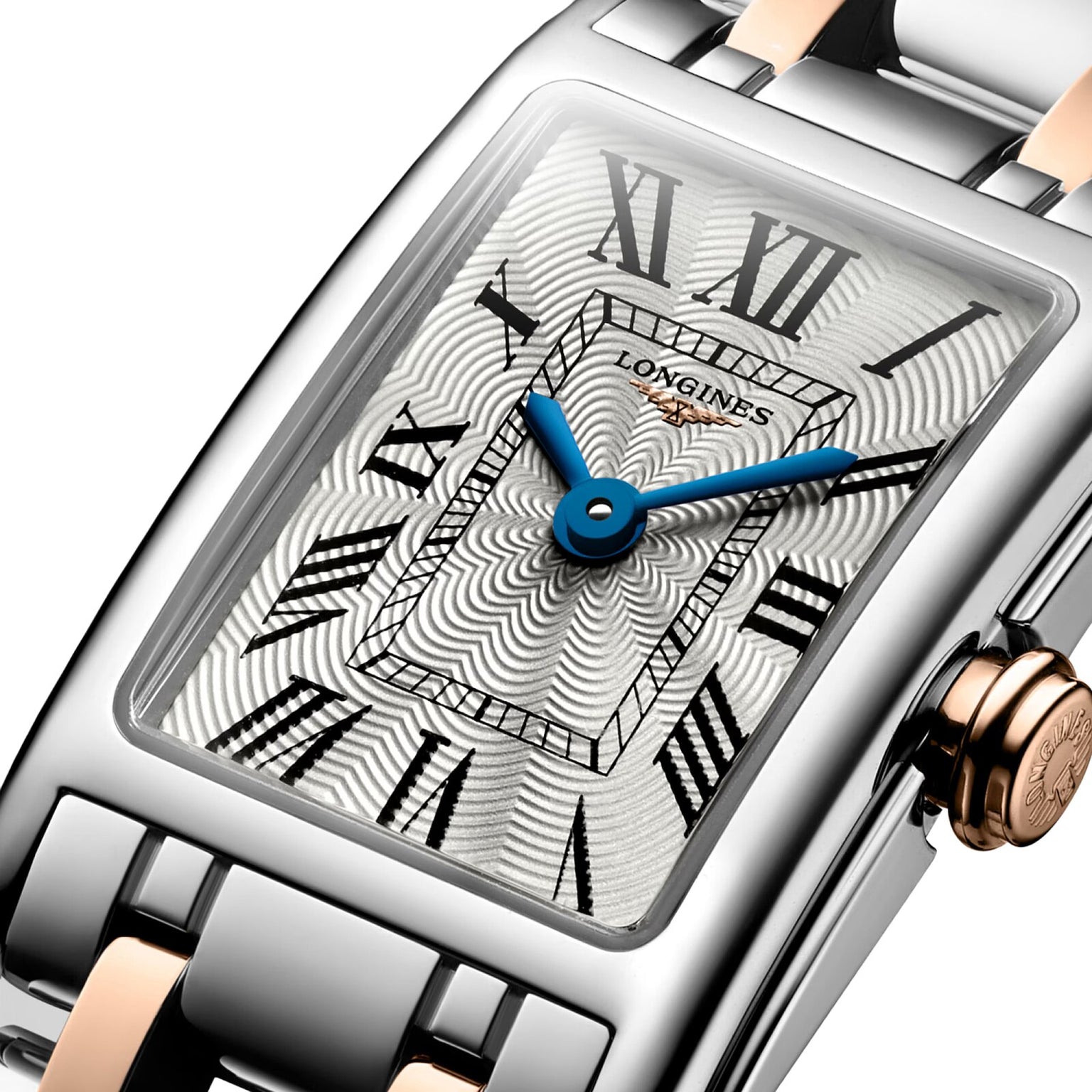 The Longines Dolcevite features a rectangular case, silver dial with blue hands, Roman numerals, and a two-tone metal band.