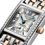 Close-up of the Longines Mini Dolcevita watch featuring blue hands, Roman numerals, and a two-tone metal band.