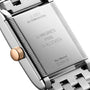 Close-up of the stainless steel back of a Longines Mini Dolcevita watch displaying its model and serial numbers.