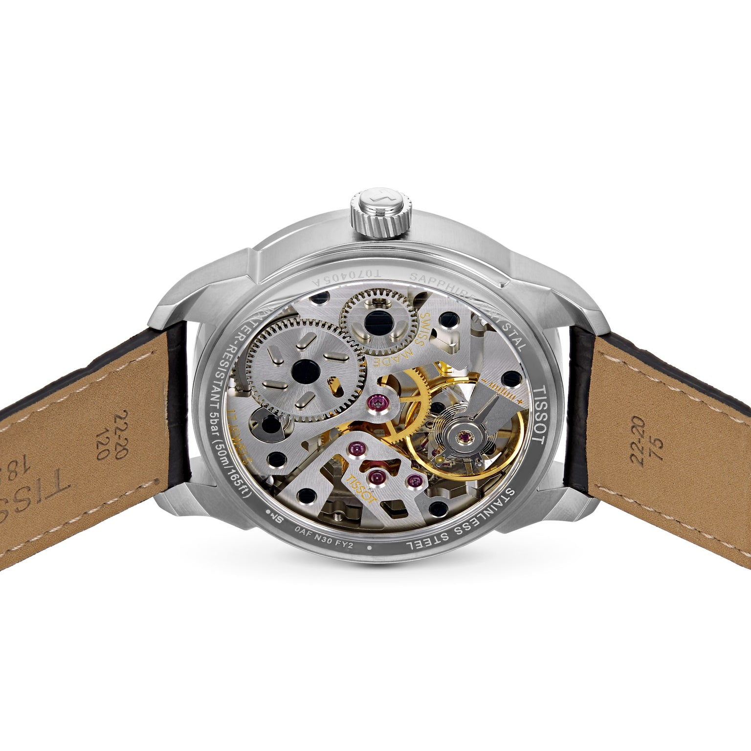 Back view of the Tissot T-Complication Squelette Mechanical watch displaying its luxury skeleton movement and visible gears through a transparent case back.