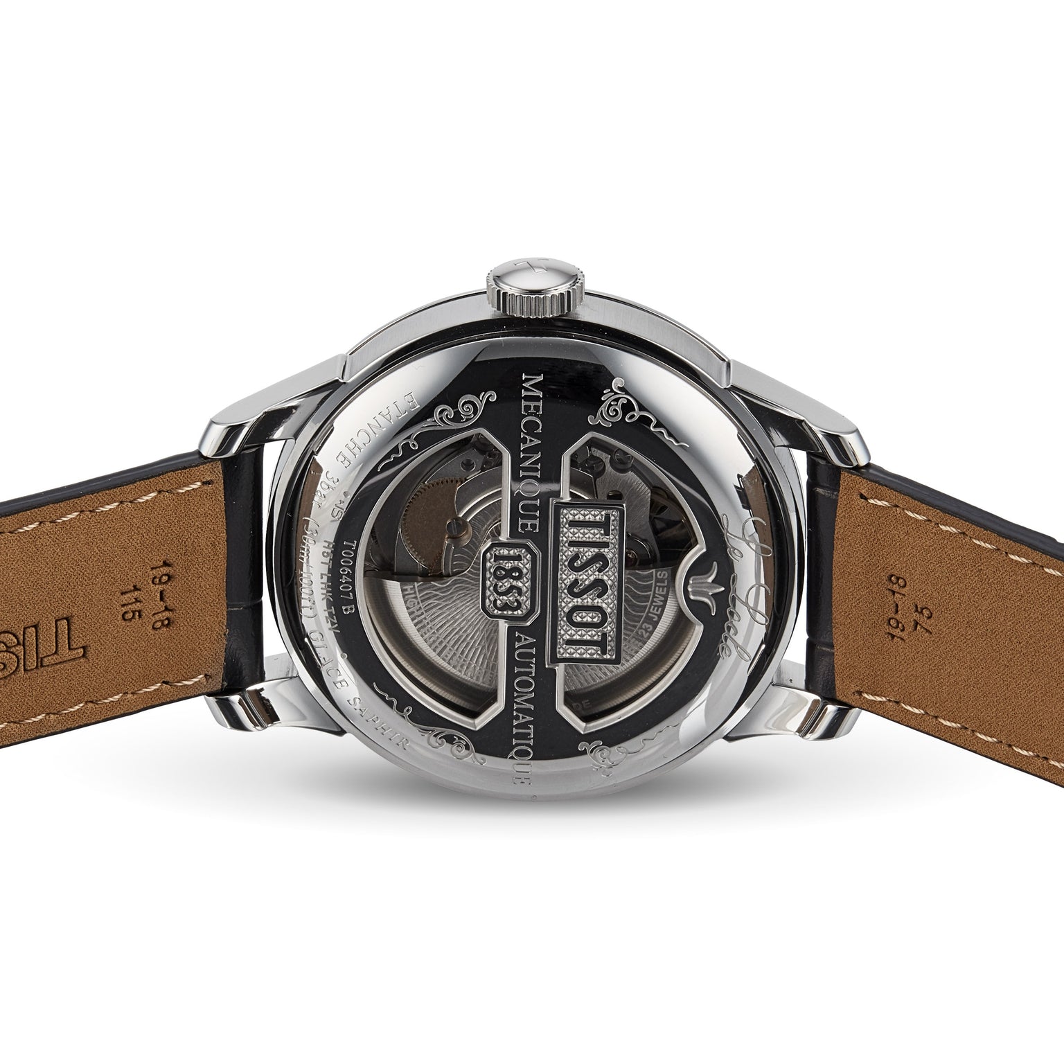 Close-up of the Tissot Le Locle Powermatic 80’s transparent case back displays its mechanical movement and engraved details, with brown leather straps showcasing Swiss craftsmanship from Le Locle, Jura Mountains.