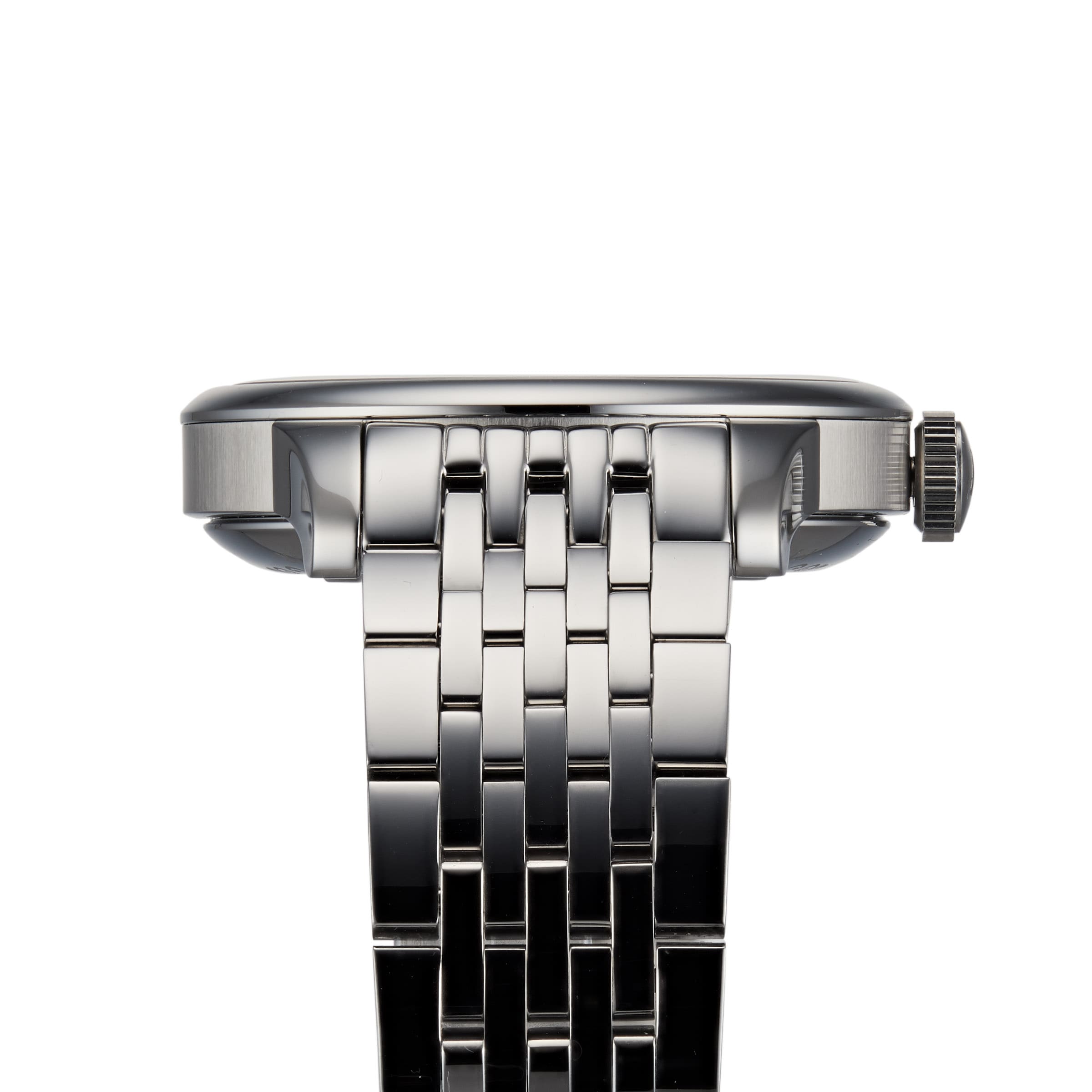Side view of the Tissot Le Locle Powermatic 80, featuring a silver metal link band, round case, and visible crown—crafted in the heart of the Swiss Jura Mountains.