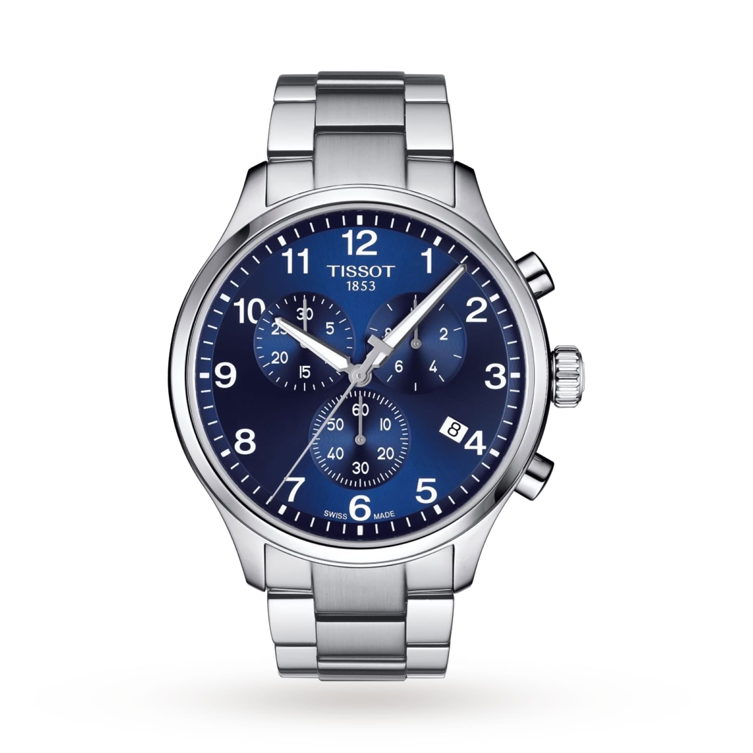 The Tissot Chrono XL Classic is a stainless steel chronograph watch with a blue dial, three subdials, numbered markers, and a date window at 4 o’clock, powered by Swiss quartz movement and shown on a white background.