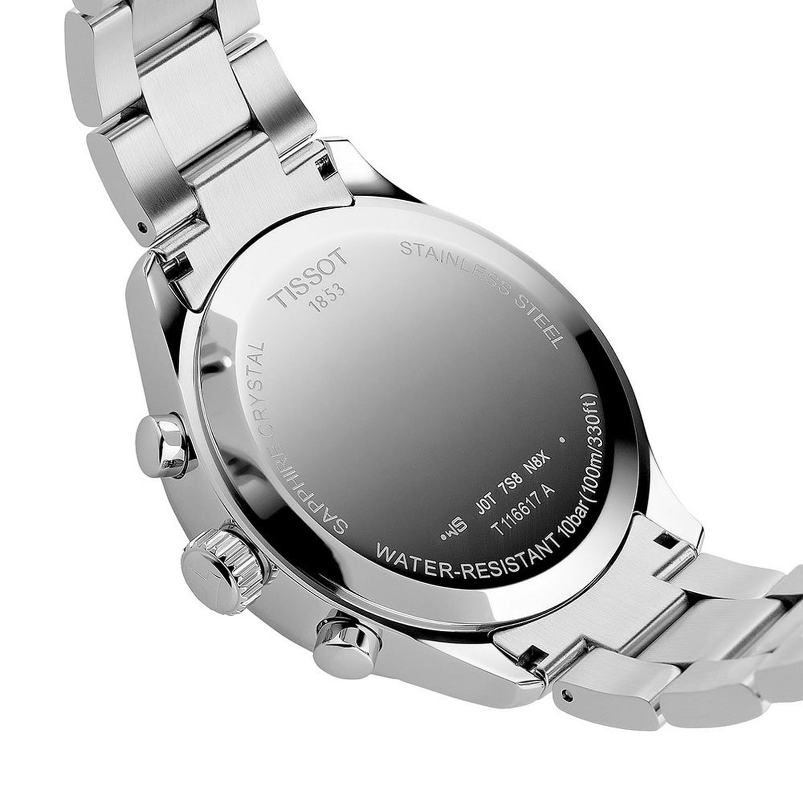 Close-up of the back of a stainless steel Tissot Chrono XL Classic wristwatch showing engraved model details, Swiss quartz movement, and water resistance info.