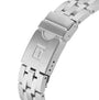 Close-up of the stainless steel Tissot Seastar 1000 Powermatic 80 bracelet with a fold-over clasp, showcasing an embossed rectangular logo—a perfect complement to this high-performance Tissot sports watch.