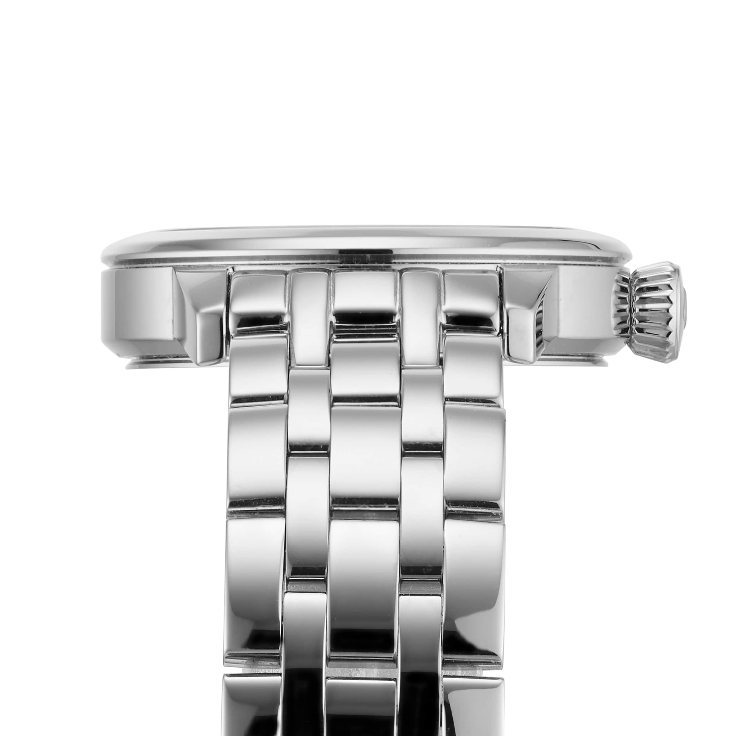 Close-up side view of the Tissot Classic Dream’s silver metal wristwatch band and crown, highlighting the intricate links and elegant watch case—an embodiment of luxury and style.