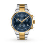 The Tissot Chrono XL Classic features a blue dial, gold and silver metal band, gold crown and pushers, three subdials, and a date window at 4 o’clock—ideal for fans of sporty yet elegant timepieces.