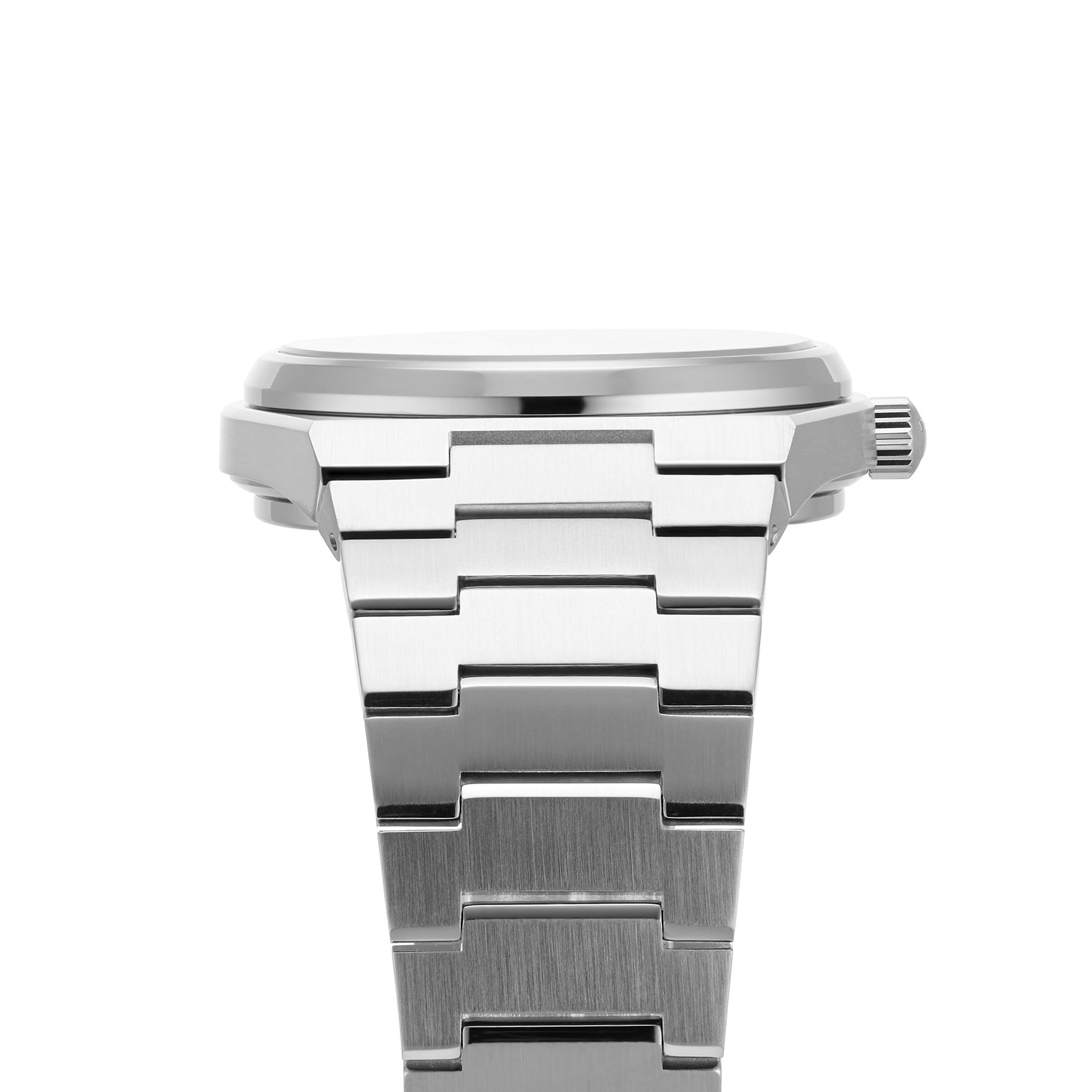 Close-up side view of the Tissot PRX Powermatic 80, featuring a stainless steel case, crown, and metal link bracelet, set against a white background.