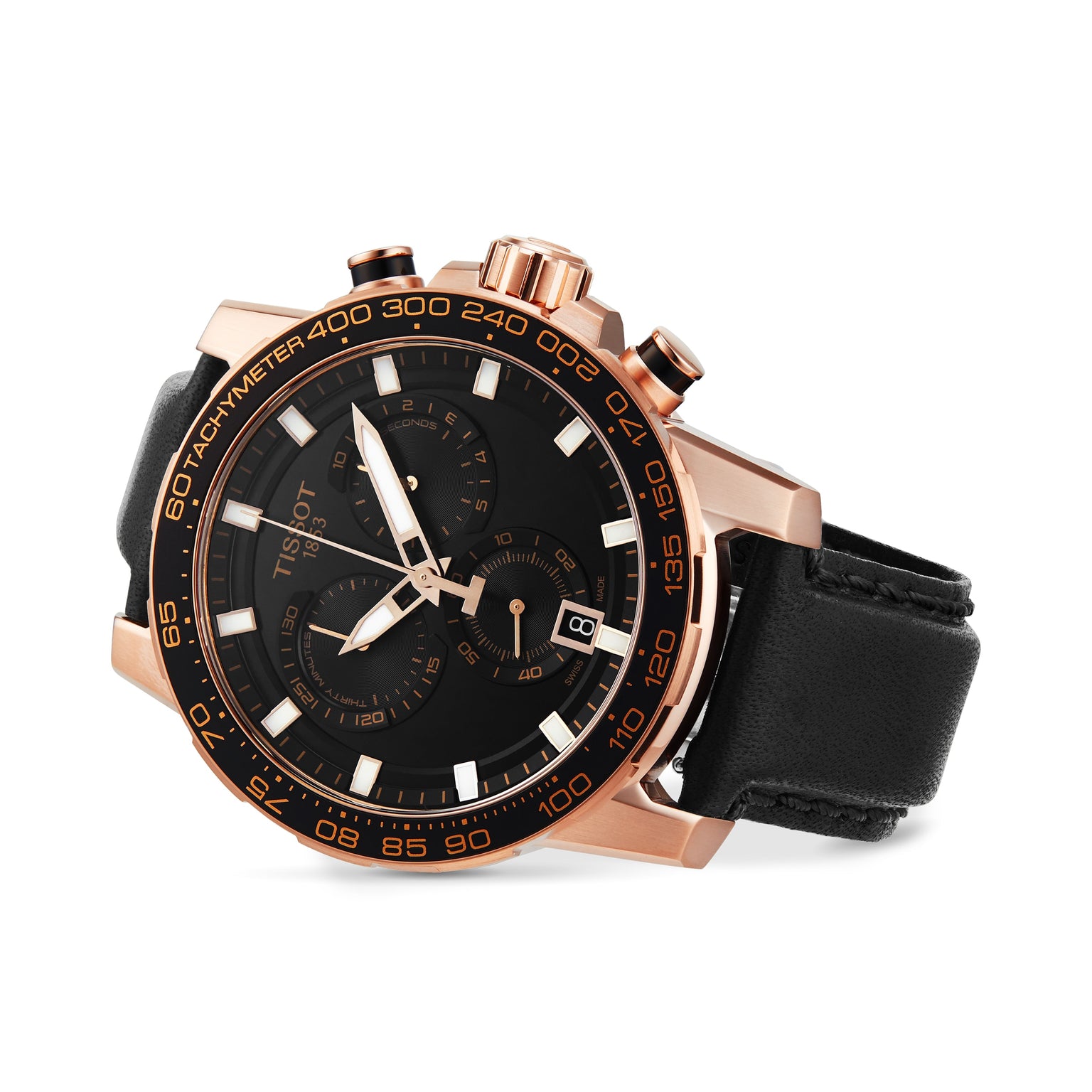 The Tissot Supersport Chrono features a black and gold design, tachymeter bezel, Swiss quartz movement, black leather strap, and three subdials. Shown at an angle on a white background.