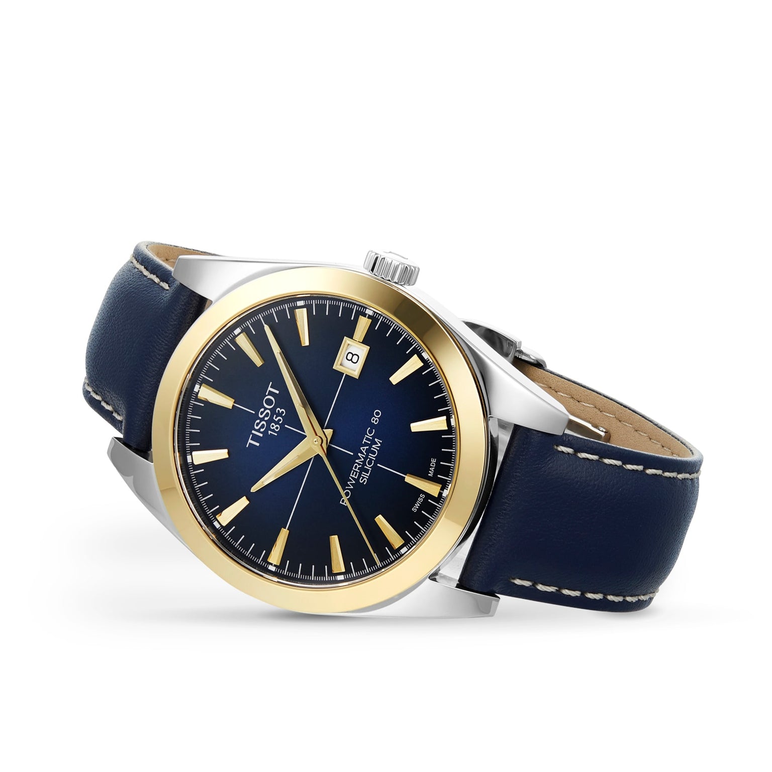 The Tissot Gentleman Powermatic 80 Silicium with a solid 18k gold bezel features a black dial, date display, and blue leather strap, blending luxury and style with renowned Powermatic 80 movement.