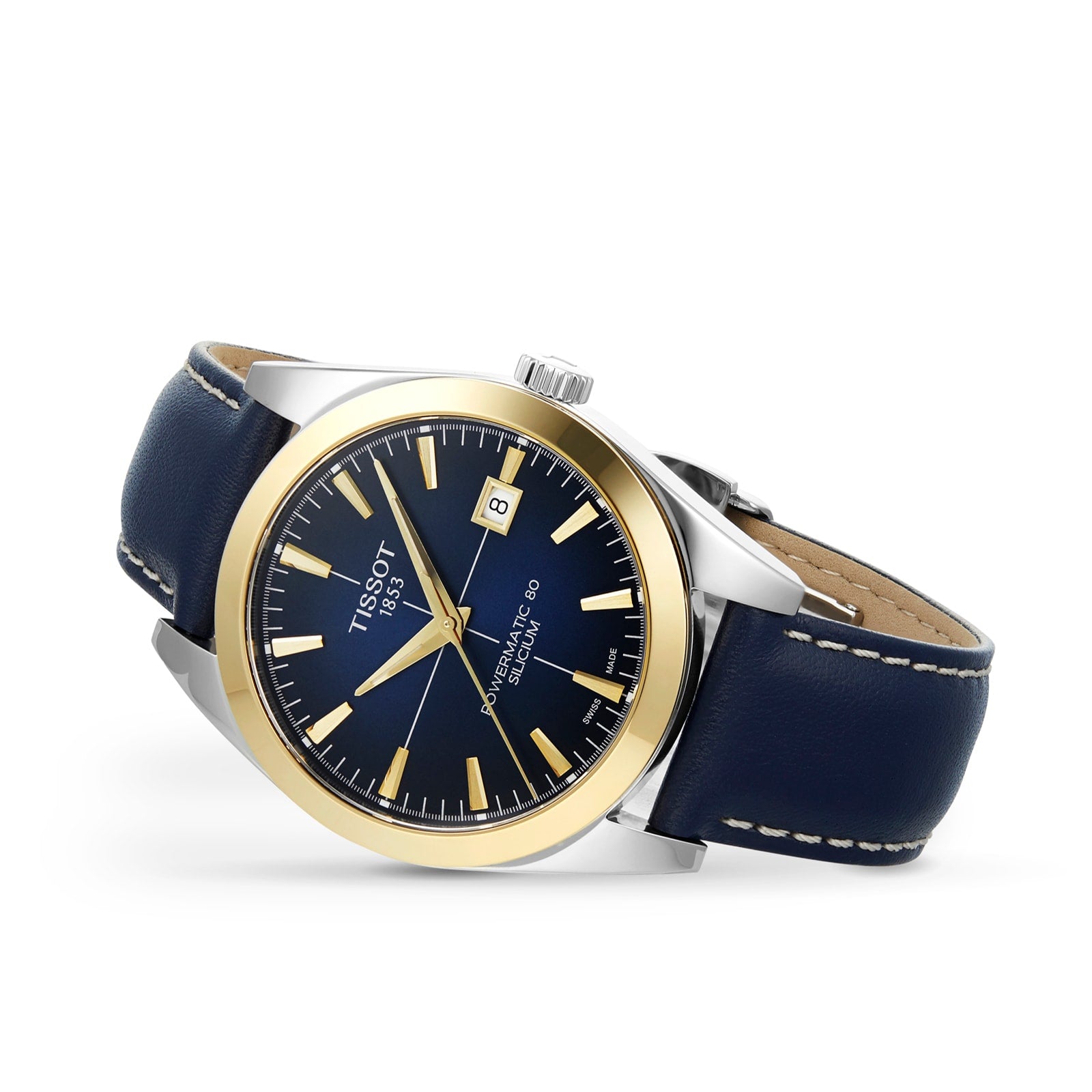 The Tissot Gentleman Powermatic 80 Silicium with a solid 18k gold bezel features a black dial, date display, and blue leather strap, blending luxury and style with renowned Powermatic 80 movement.