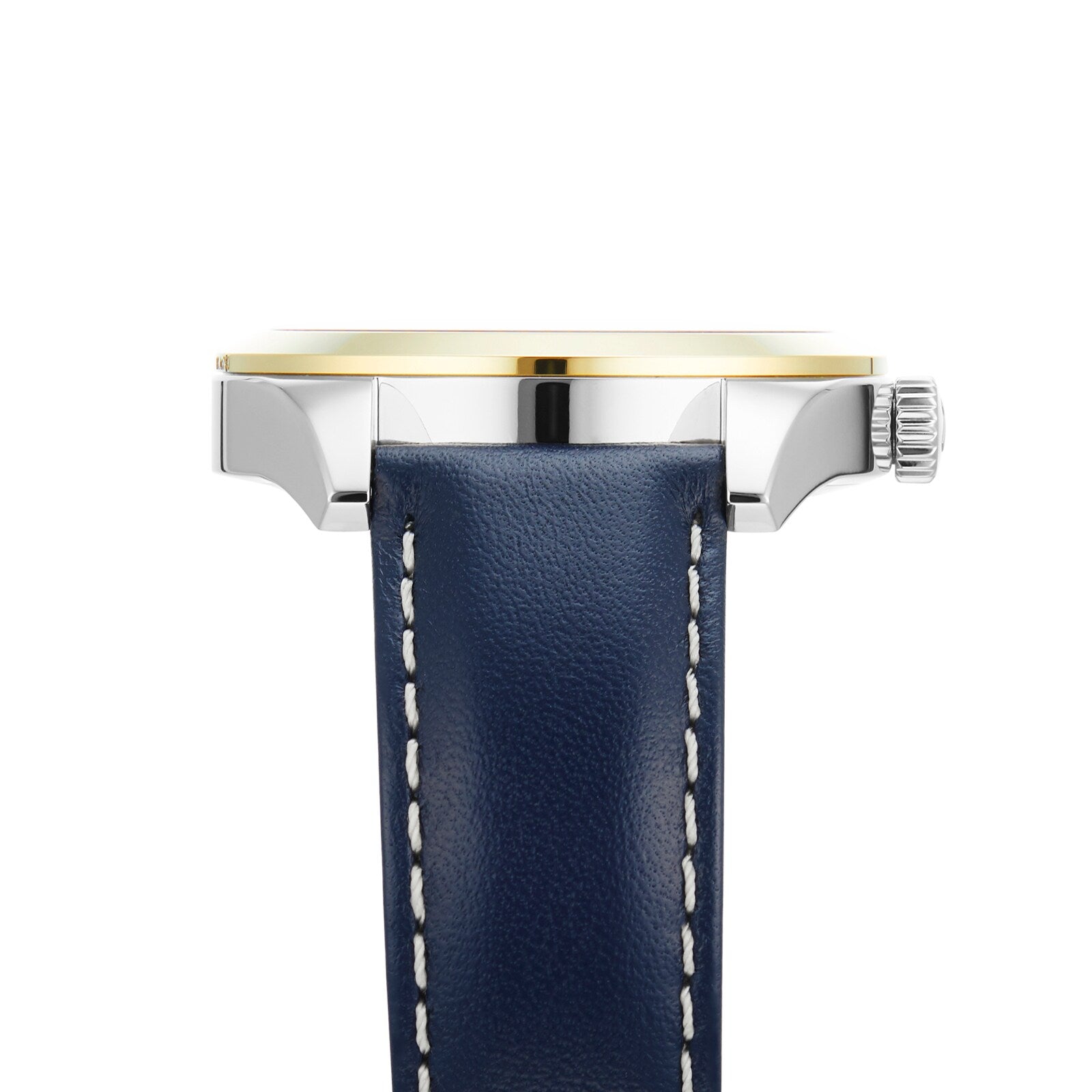 Side view of the Tissot Gentleman Powermatic 80 Silicium Solid 18k Bezel watch, featuring a blue leather strap with white stitching, silver case, gold bezel, and ridged crown—luxury meets style powered by the Powermatic 80 movement.