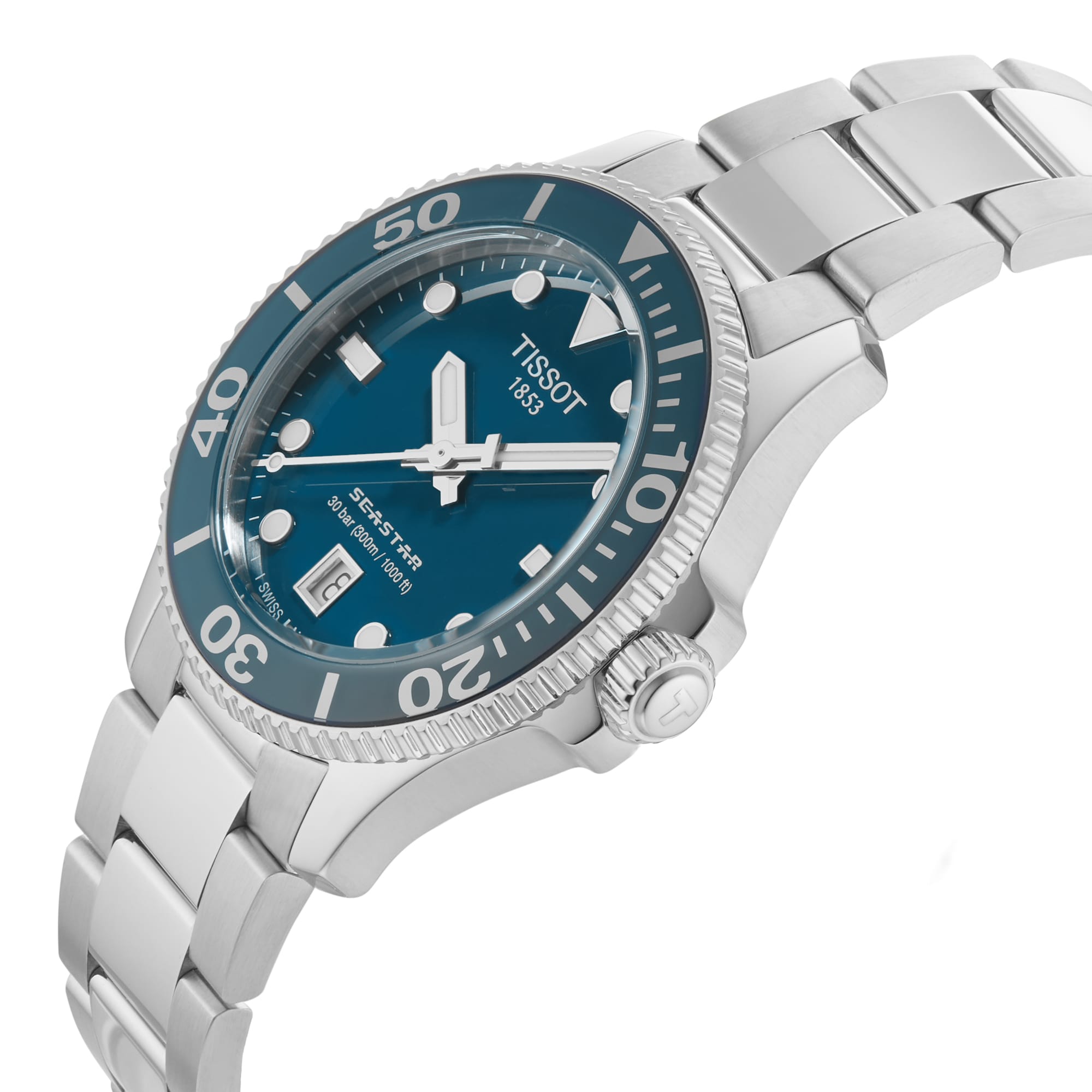 A Tissot Seastar 1000 divers watch with a teal dial, white indices, date display, and stainless steel bracelet, angled to highlight its water-resistant face and side crown.