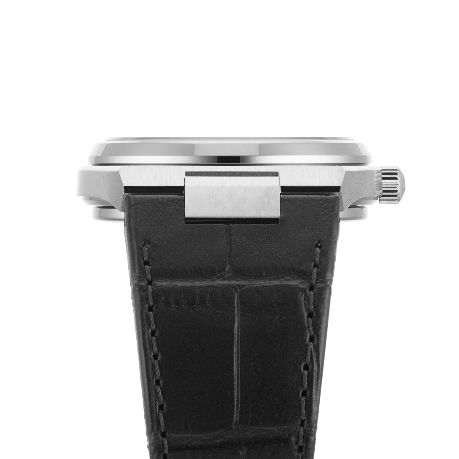 Close-up side view of the Tissot PRX Powermatic 80’s stainless steel case with crown and black leather strap with visible stitching and crocodile pattern, highlighting its 1970s-inspired design.