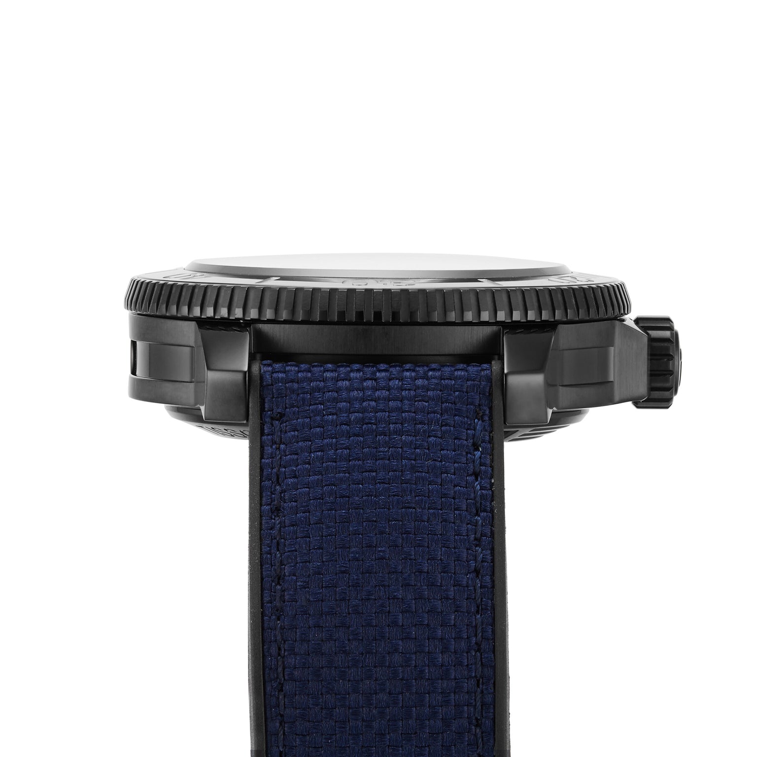 Close-up side view of the Tissot Seastar 2000 Professional Powermatic 80, featuring a textured dark blue strap and black ridged bezel, set against a white background.