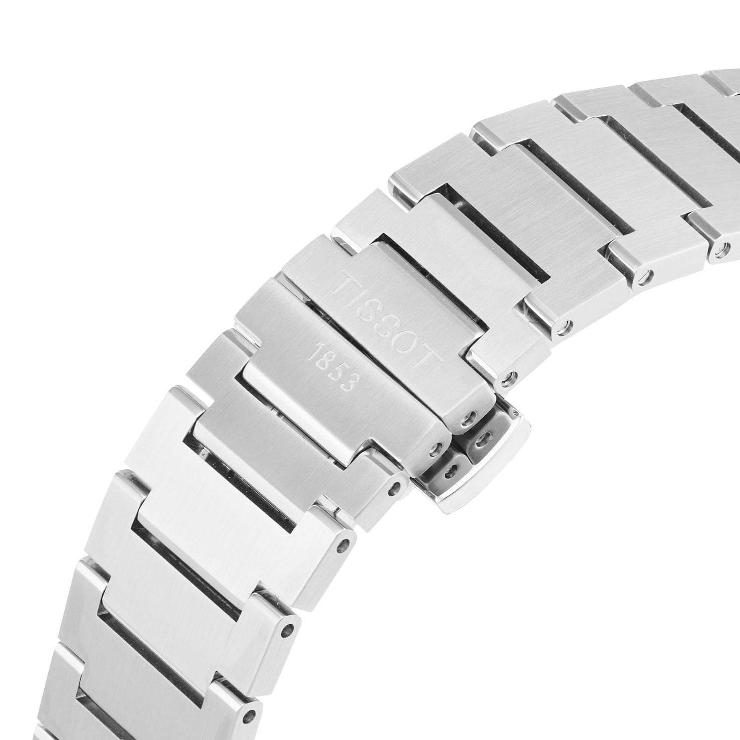 Close-up of the Tissot PRX Powermatic 80s stainless steel bracelet, featuring TISSOT 1853 on the clasp, showcases the refined craftsmanship and lasting quality Tissot is known for, all set against a white background.