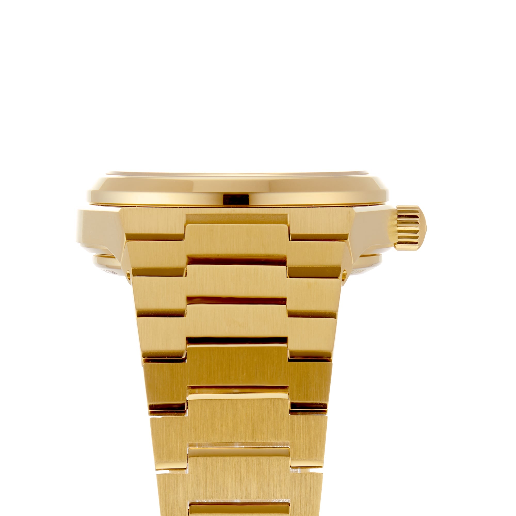 Close-up of the Tissot PRX Powermatic 80’s side profile and bracelet, highlighting its gold-PVD finish and elegant waffle dial against a plain white background.