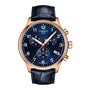 The Tissot Chrono XL Classic mens watch features a gold case, striking blue dial, black leather strap, date display, and three sub-dials with a precise chronograph function.