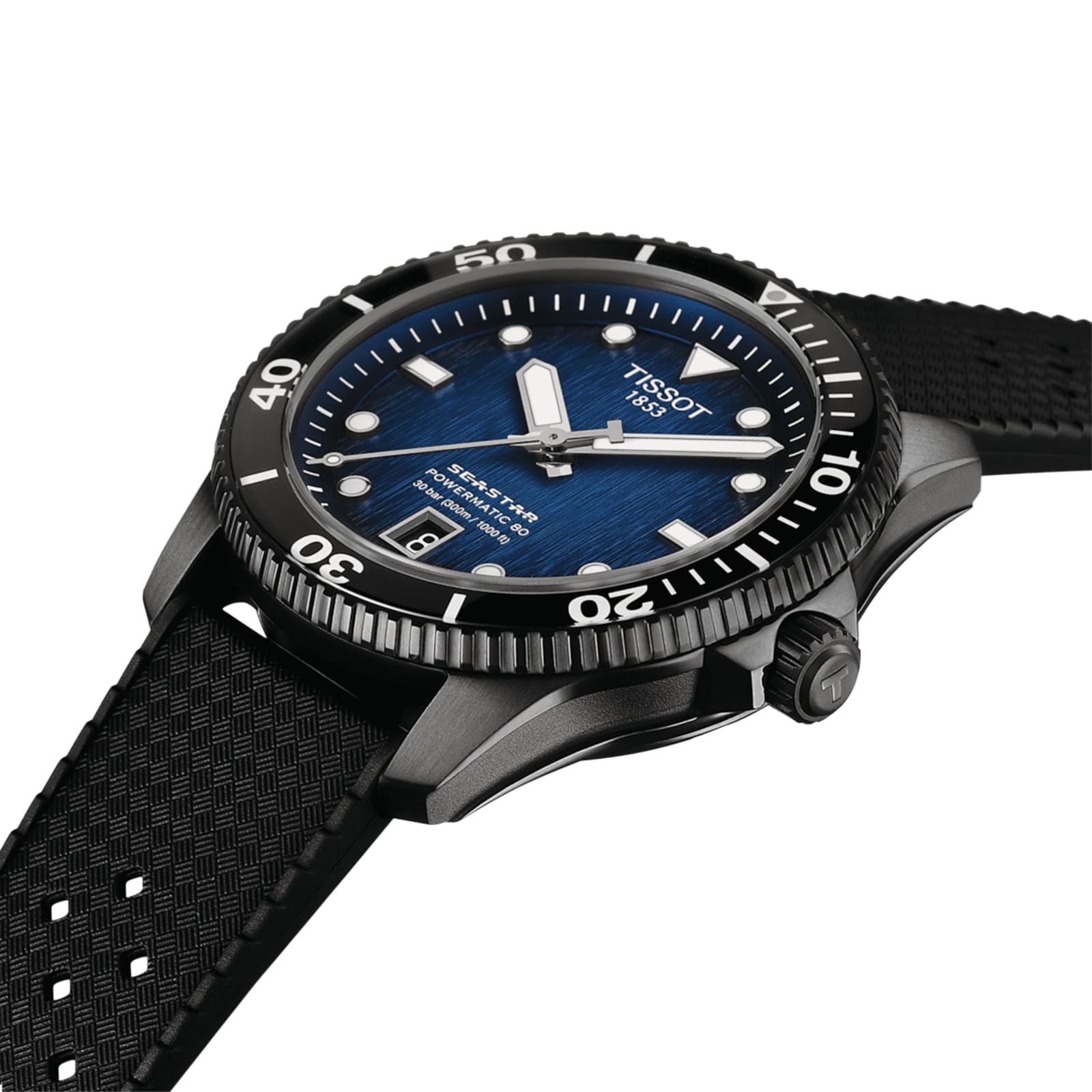 A Tissot Seastar 1000 Powermatic 80 automatic watch with a blue dial, white markers, and a black textured rubber strap is displayed at an angle.