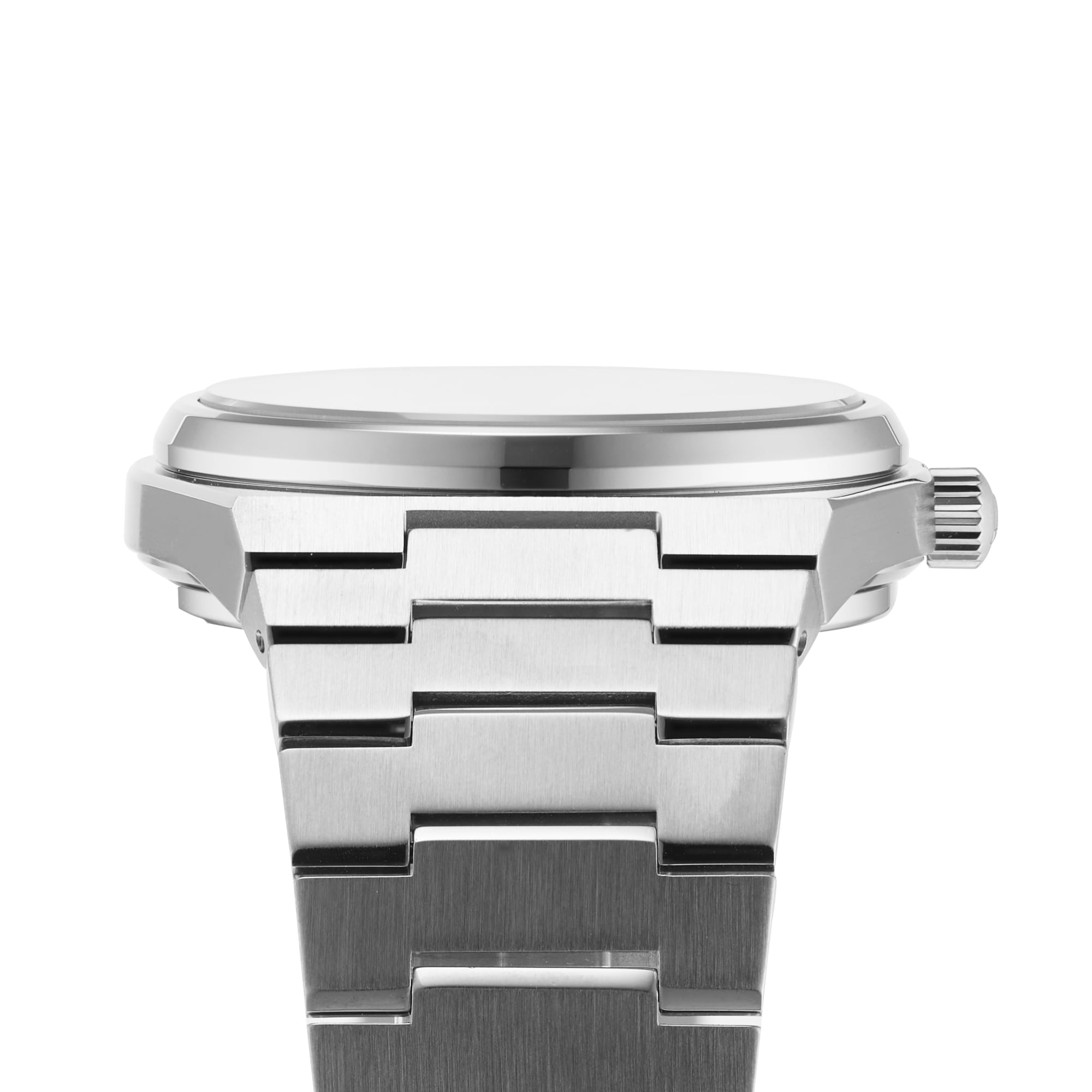 Side view of a Tissot PRX Powermatic 80 wristwatch featuring stainless steel, metal bracelet, automatic movement, and a crown on the right.