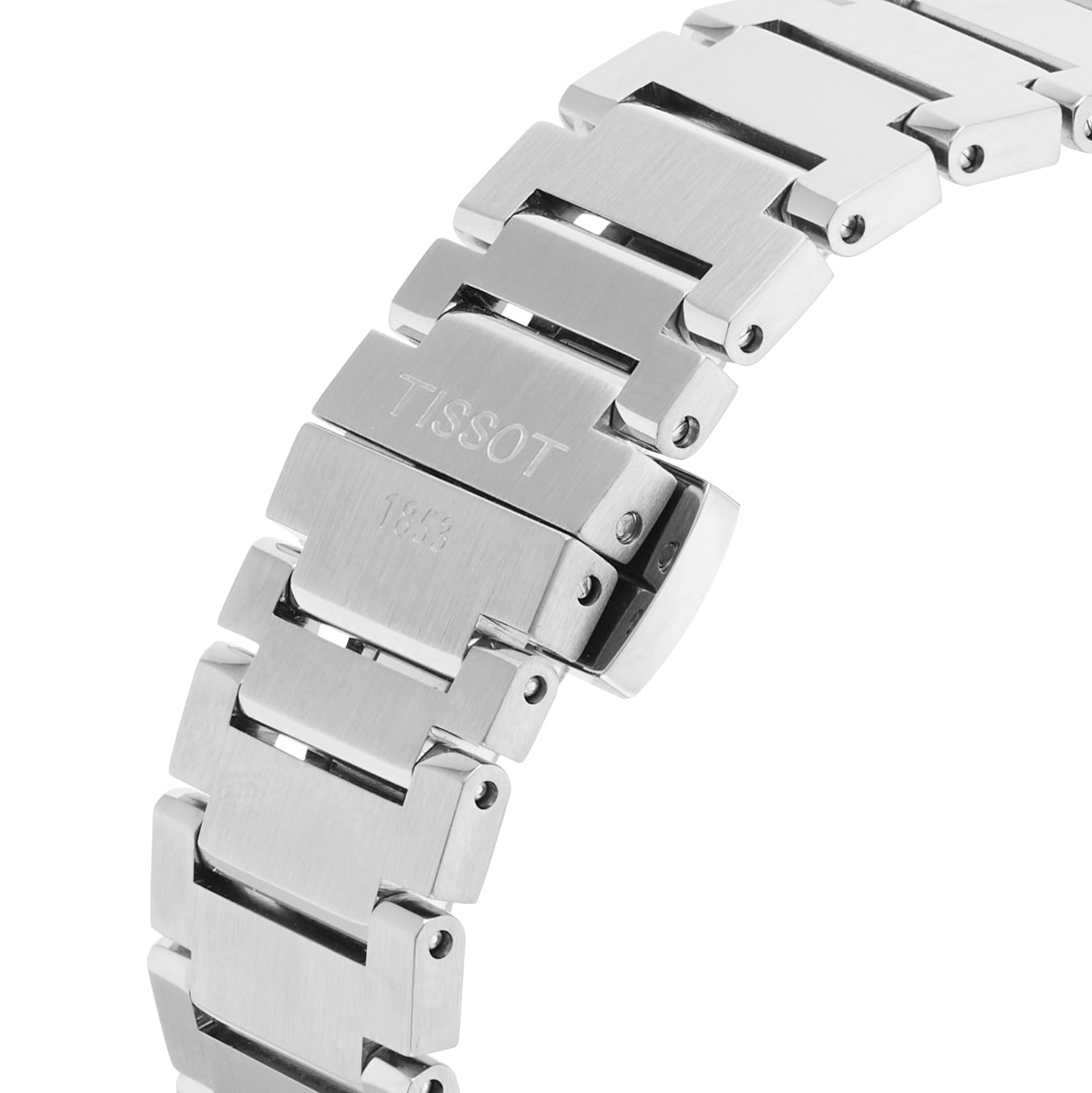 Close-up of the stainless steel bracelet on the Tissot PRX Powermatic 80, highlighting the clasp engraved with Tissot branding and reference numbers.