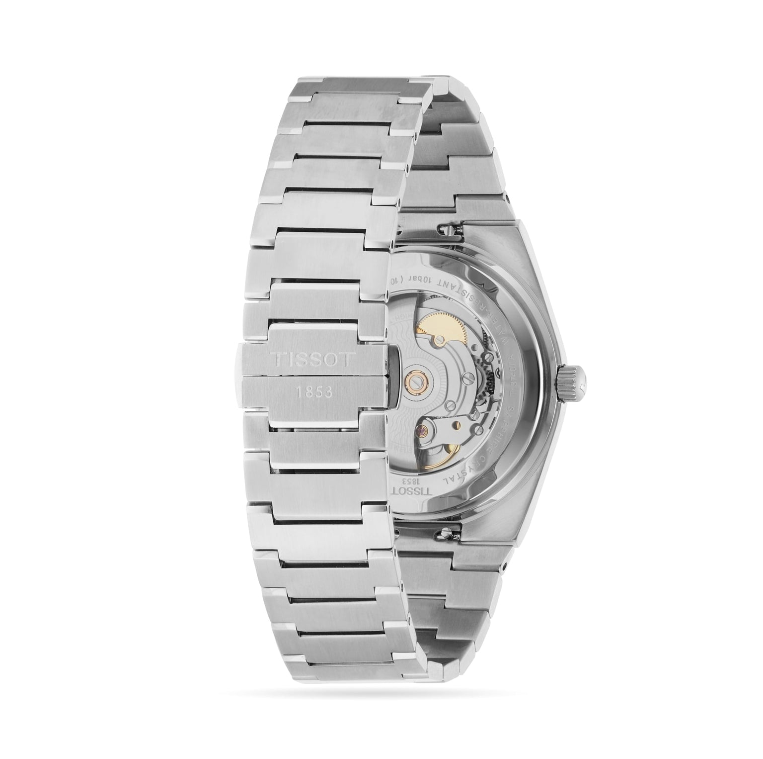 The Tissot PRX Powermatic 80 is shown from the back, revealing its automatic movement with a Nivachron hairspring through a transparent case back and showcasing a sleek stainless steel bracelet.