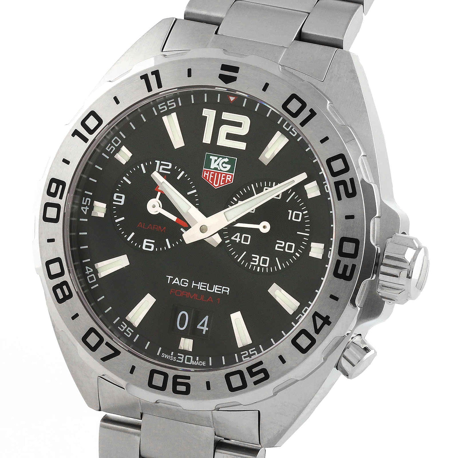 The TAG Heuer Formula 1 Date is a stainless steel sports watch with a black dial, luminous hour markers, three subdials, date display, and a metal bracelet.
