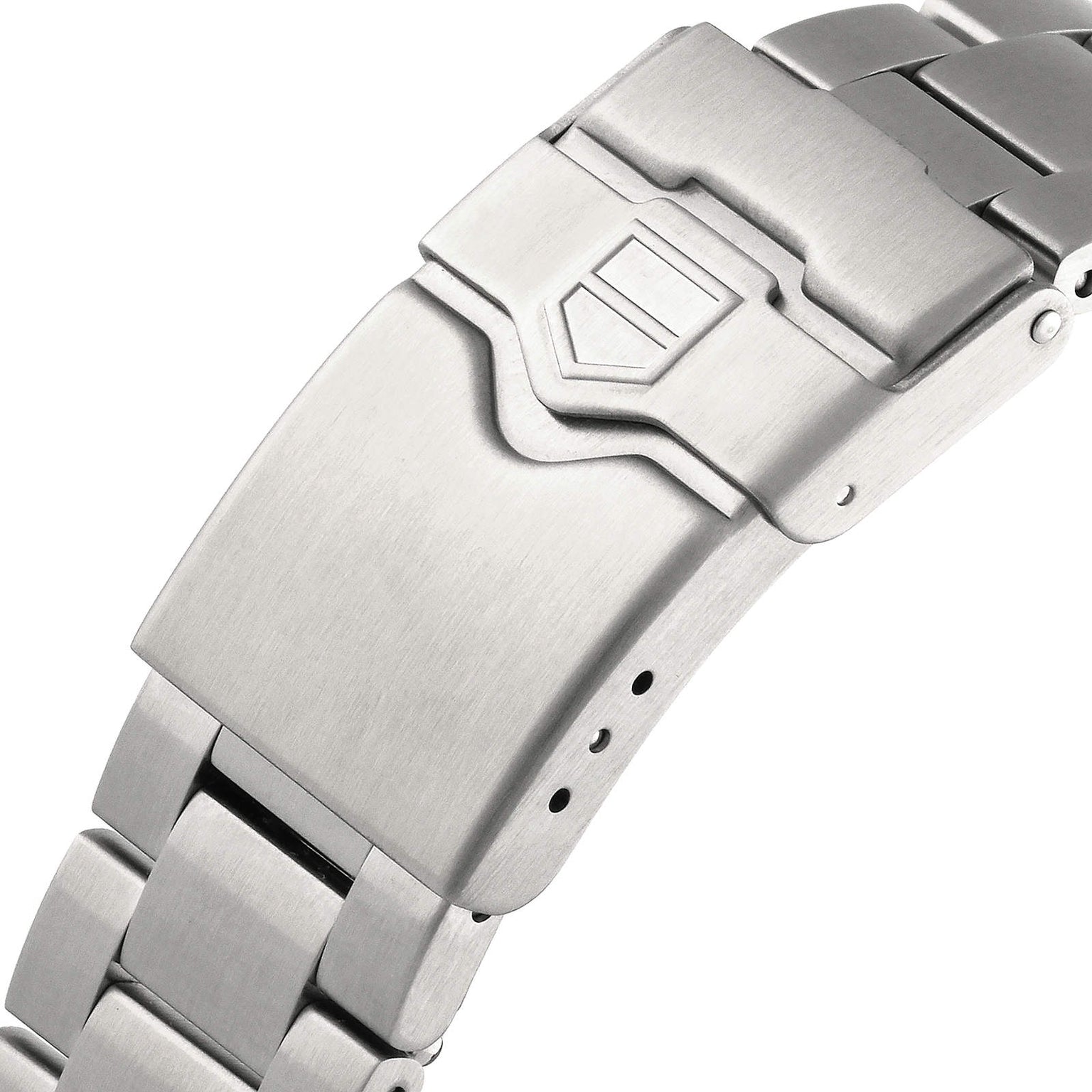Close-up of a brushed stainless steel bracelet clasp featuring an engraved shield emblem, highlighting the precision engineering of the TAG Heuer Formula 1 Date watch.