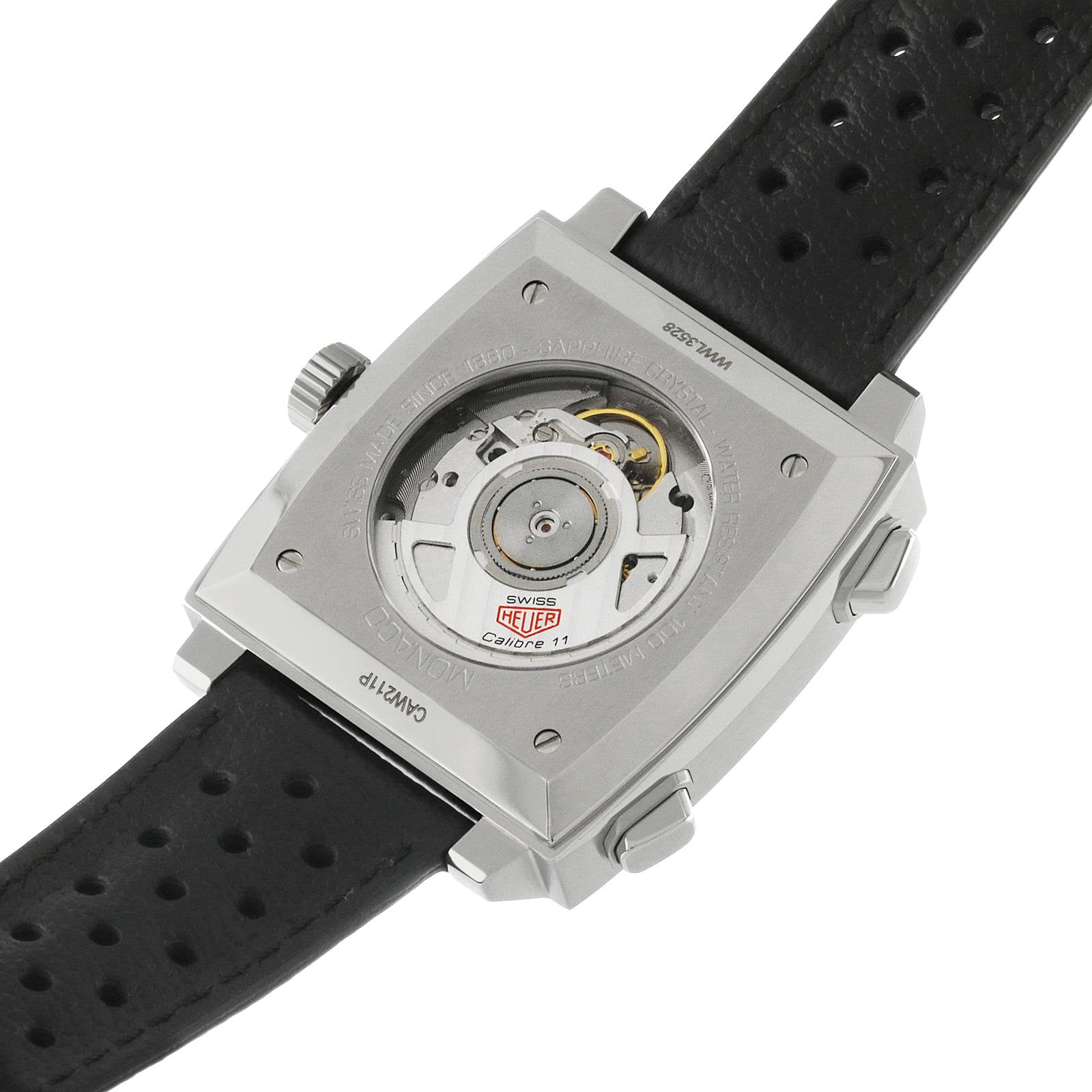Back view of the TAG Heuer Monaco Chronograph, highlighting its automatic movement through a transparent case back and a perforated black leather strap inspired by Steve McQueen.