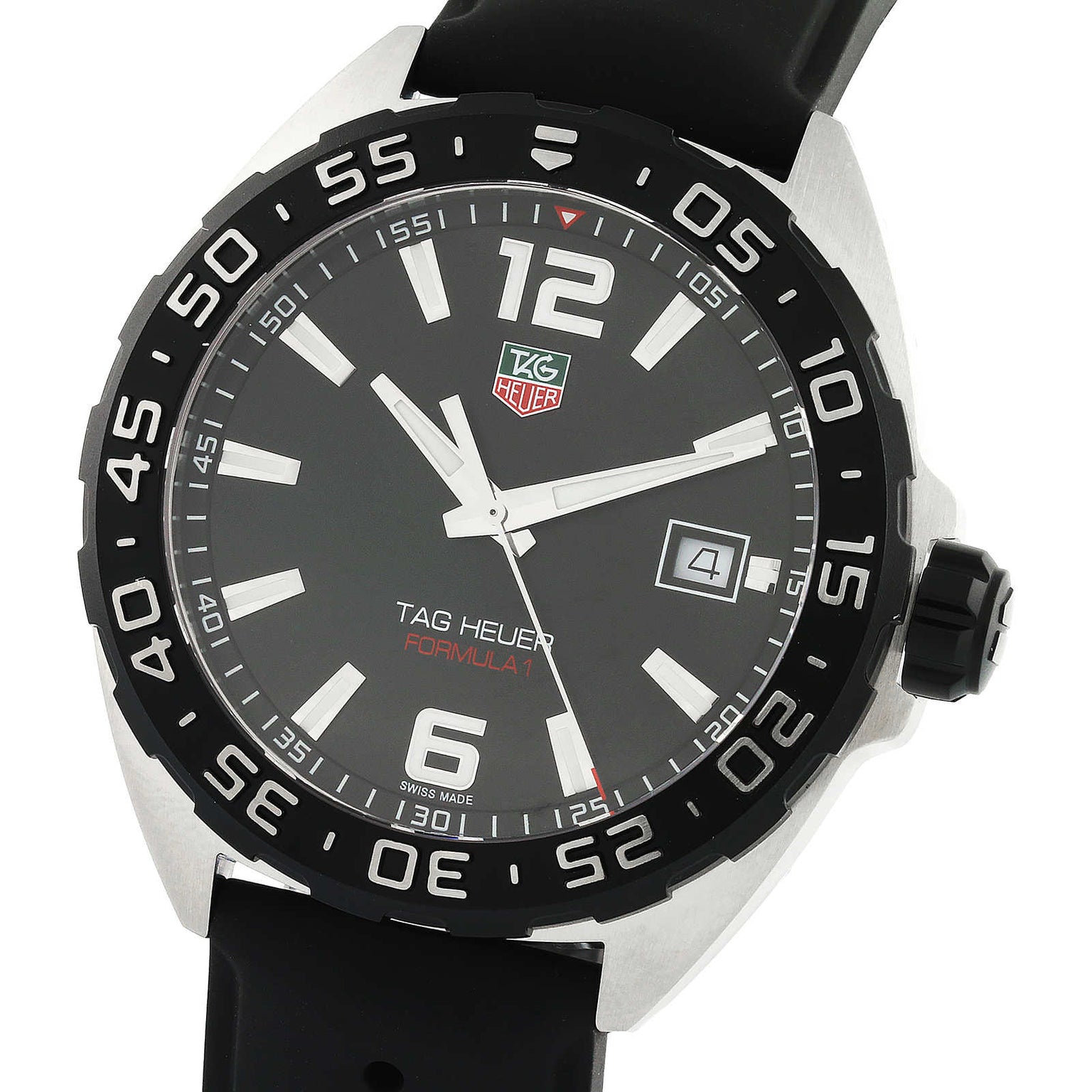 The TAG Heuer Formula 1 Date features a black dial, silver markers, date at 3 o’clock, black bezel, and a black rubber strap, all powered by reliable quartz movement.