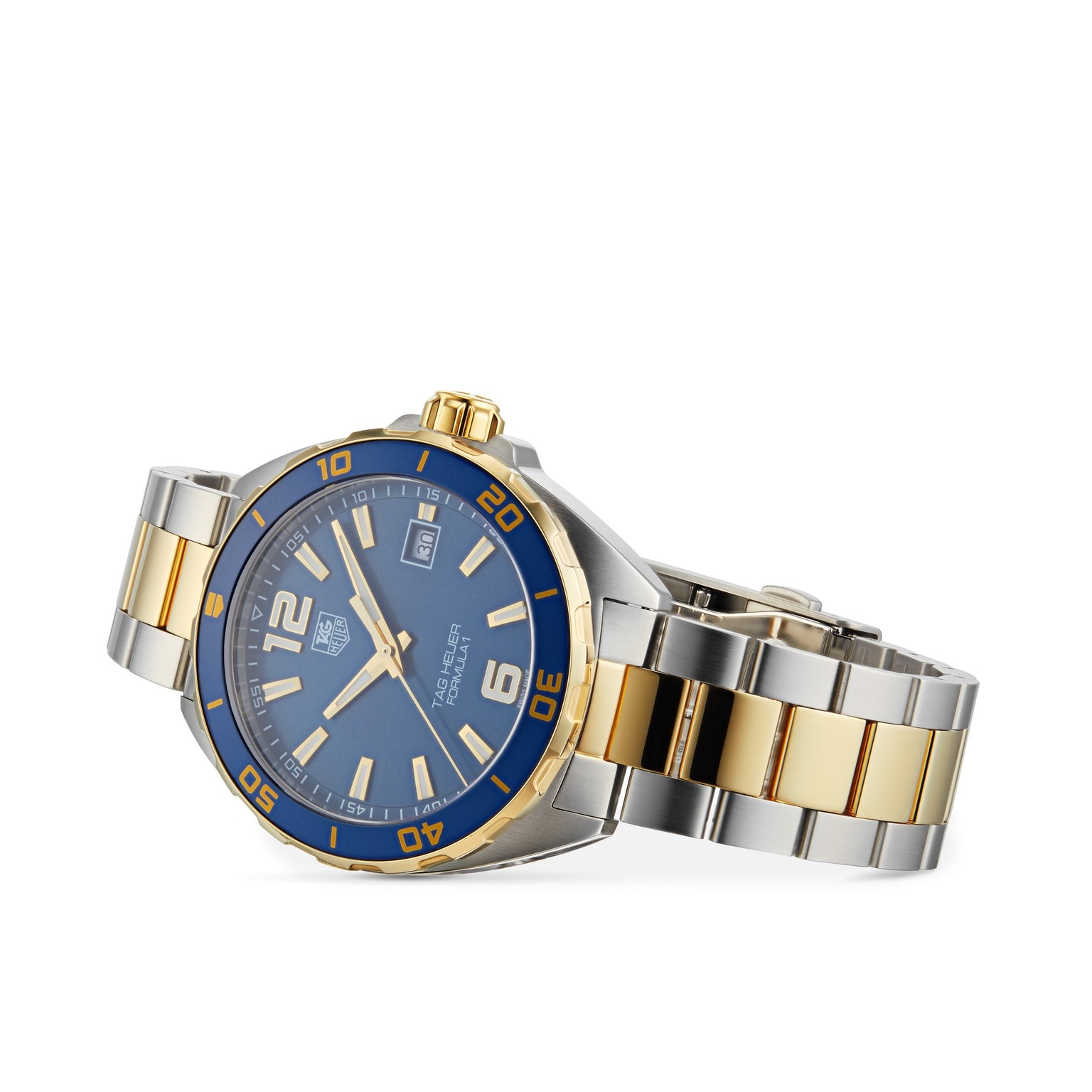 The TAG Heuer Special Edition Formula 1 Date wristwatch features a two-tone stainless steel and gold design with a blue dial and bezel, displaying date and time—highlighting iconic style and precise quartz movement.