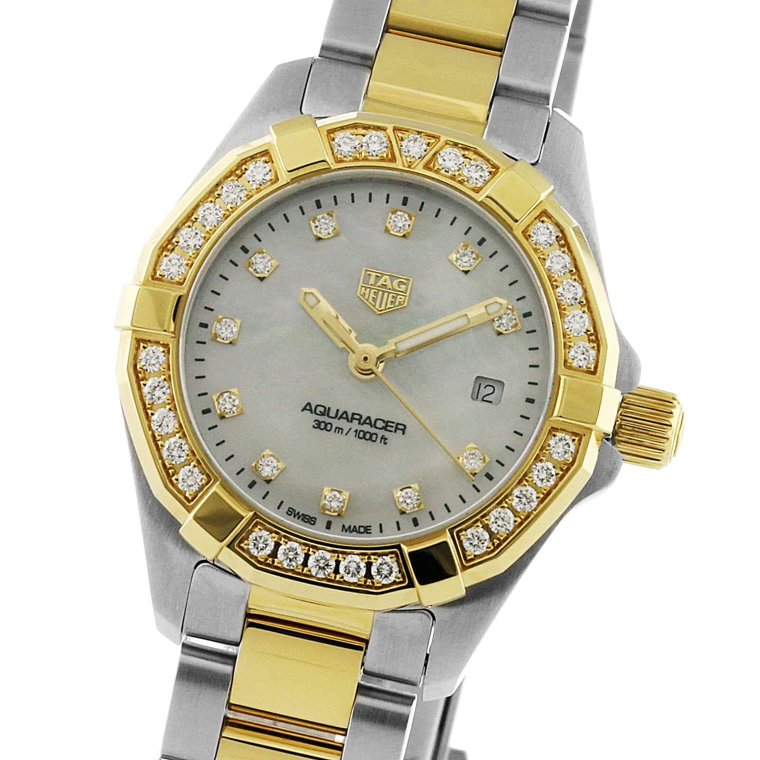 The TAG Heuer Aquaracer Date watch features a two-tone metal band, gold accents, and a diamond-set bezel.