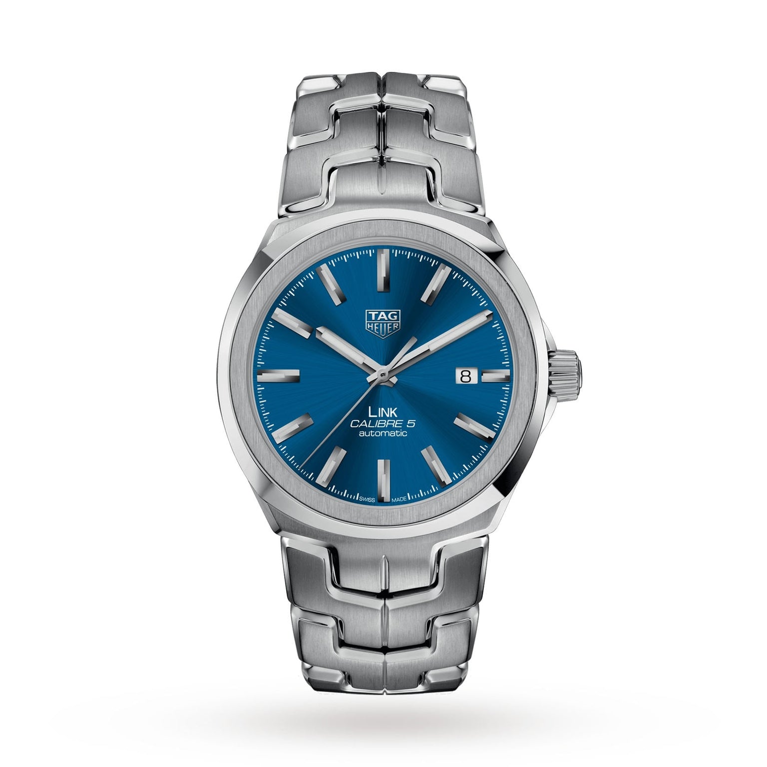 The TAG Heuer Link Date is a stainless steel men’s watch with a blue dial, silver hour markers, date at 3 o’clock, metal link bracelet, and sapphire crystal glass.
