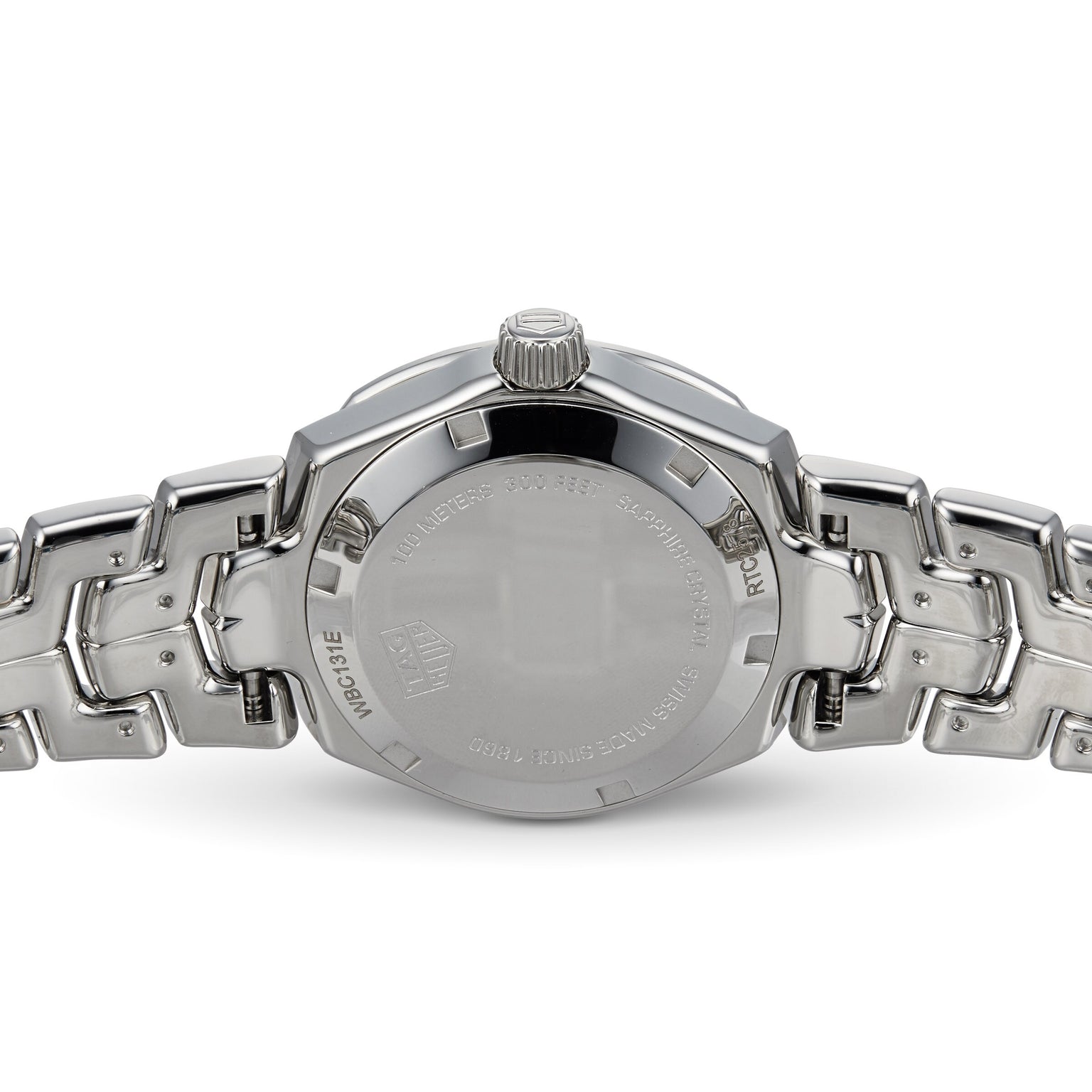 The back view of the TAG Heuer Link Date showcases the engraved case back and signature S-shaped bracelet—contrasting beautifully with its elegant sunburst taupe dial.