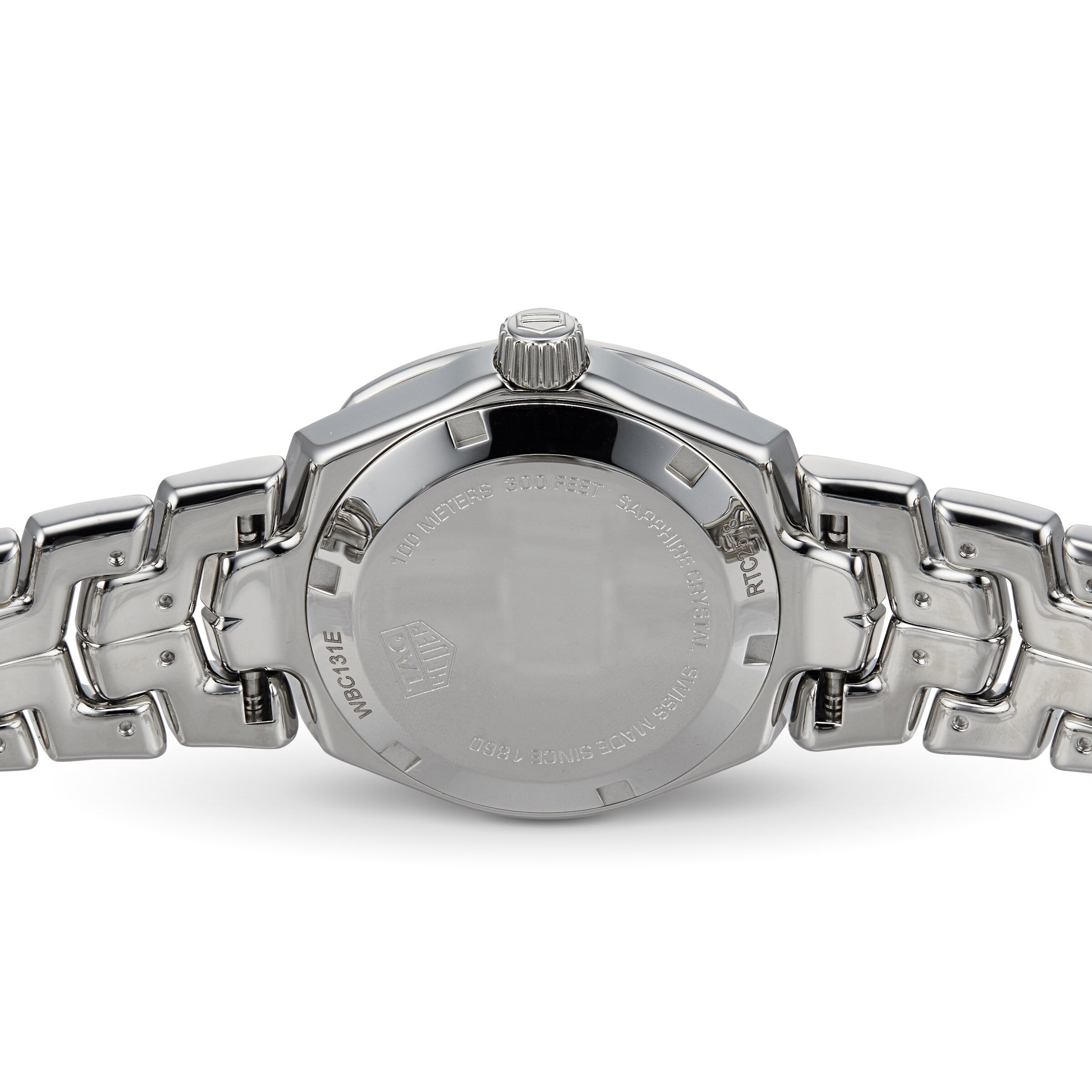 The back view of the TAG Heuer Link Date showcases the engraved case back and signature S-shaped bracelet—contrasting beautifully with its elegant sunburst taupe dial.