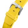 Close-up of a yellow TAG Heuer Formula 1 Chronograph watch strap featuring a textured surface and a silver buckle engraved with the TAG Heuer logo.
