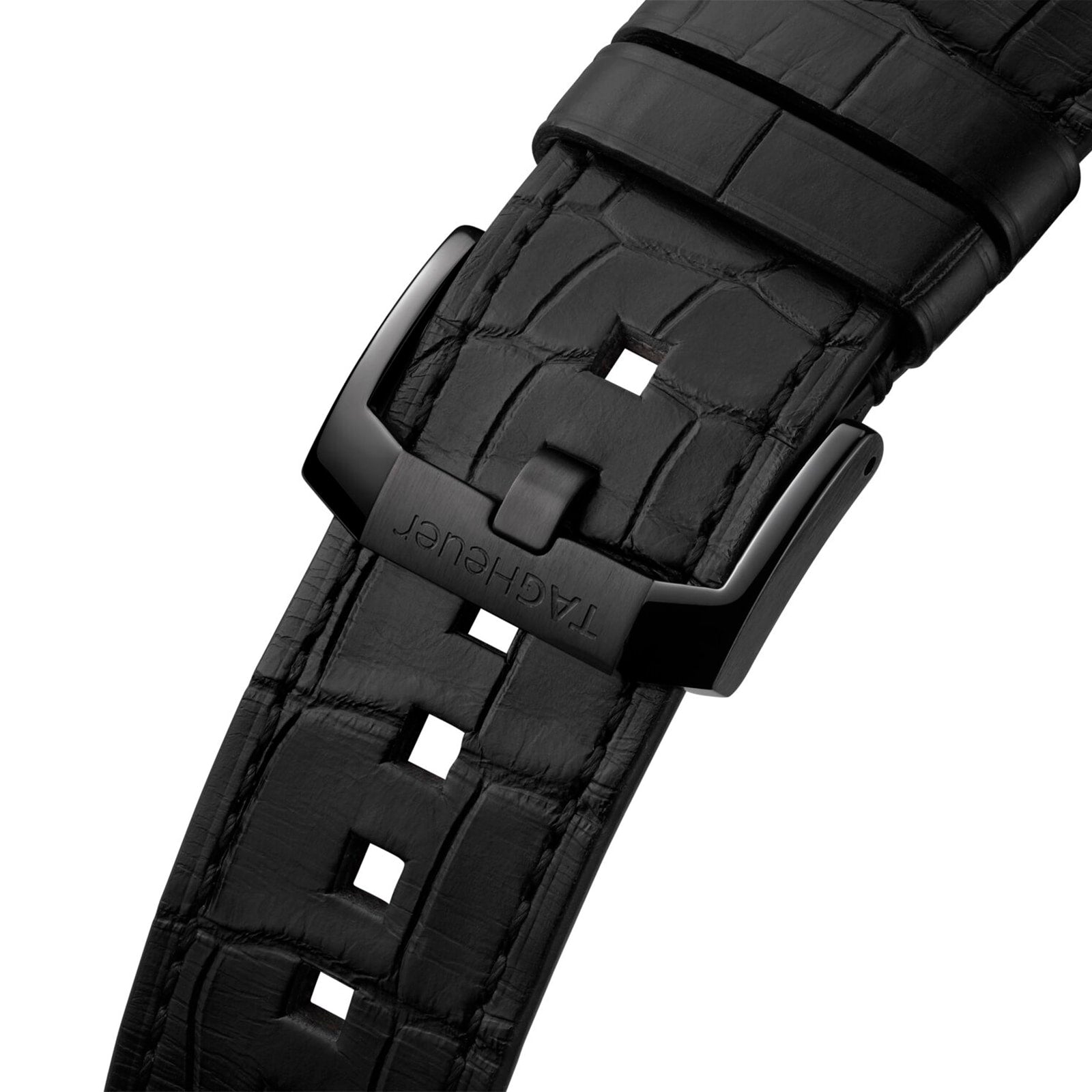 Close-up of a black leather watch strap with a metal buckle engraved with the TAG Heuer logo, designed for the Autavia Flyback Chronometer.