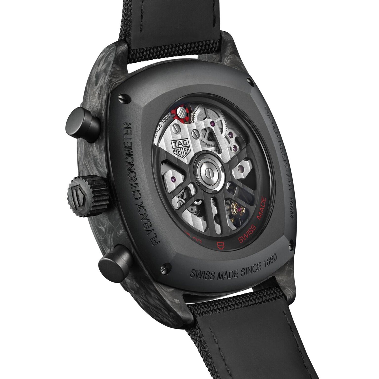 Close-up of the TAG Heuer Monza Flyback Chronometer’s back, displaying its exposed automatic movement and engraved case—highlighting the racing heritage celebrated by TAG Heuer.