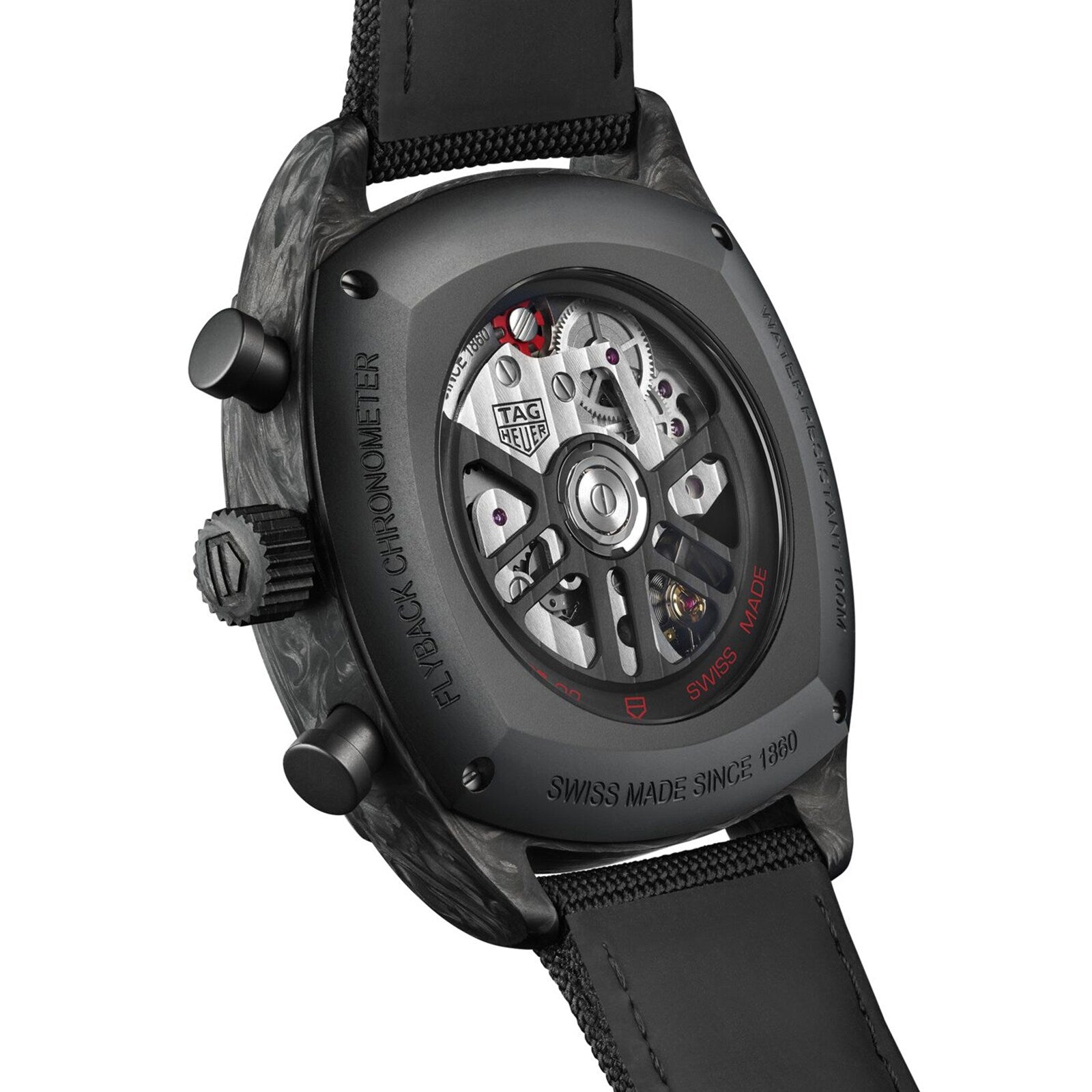 Close-up of the TAG Heuer Monza Flyback Chronometer’s back, displaying its exposed automatic movement and engraved case—highlighting the racing heritage celebrated by TAG Heuer.