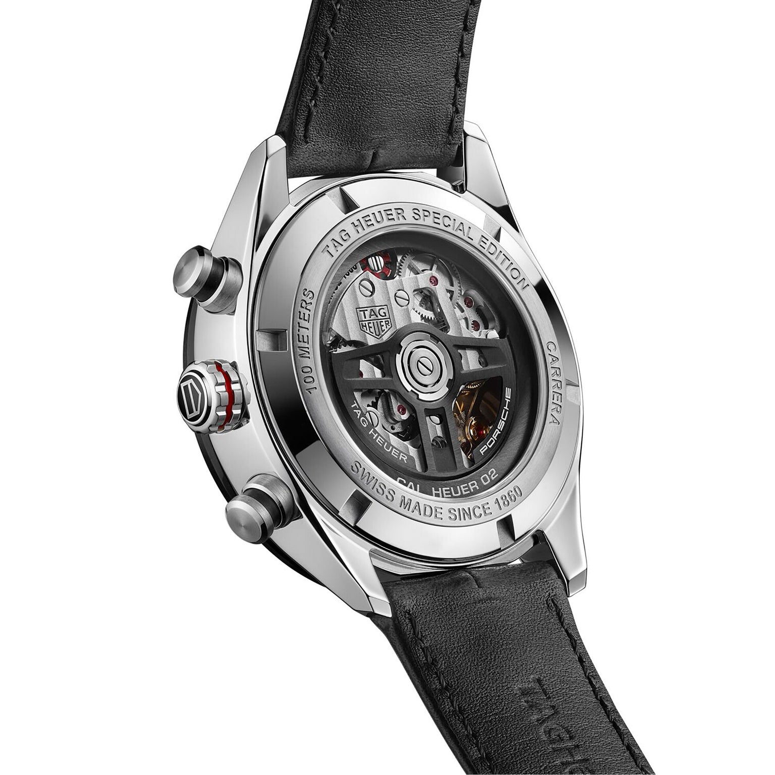 Close-up of the TAG Heuer Special Edition Carrera Chronograph x Porsche, displaying its exposed automatic movement through a transparent case back and black leather strap—a celebration of precision inspired by Porsche.