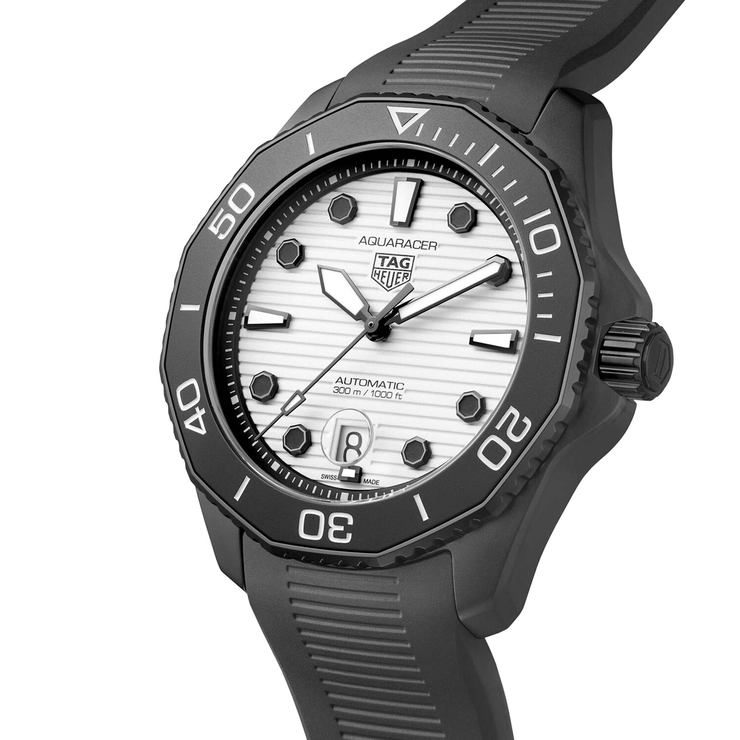 A close-up of the TAG Heuer Aquaracer Professional 300 Date watch featuring a black bezel, white textured dial, black markers, and a black rubber strap.