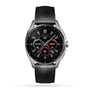 The TAG Heuer Connected Calibre E4 is a luxury smartwatch with a black leather strap, featuring an avant-garde design and a round display showing steps, calories, heart rate, and activity icons.