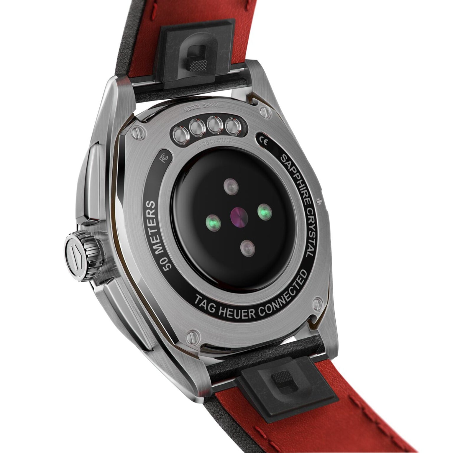 Close-up of the back of the TAG Heuer Connected Calibre E4 smartwatch, showcasing its detailed engravings, advanced sensors, and bold red leather strap.