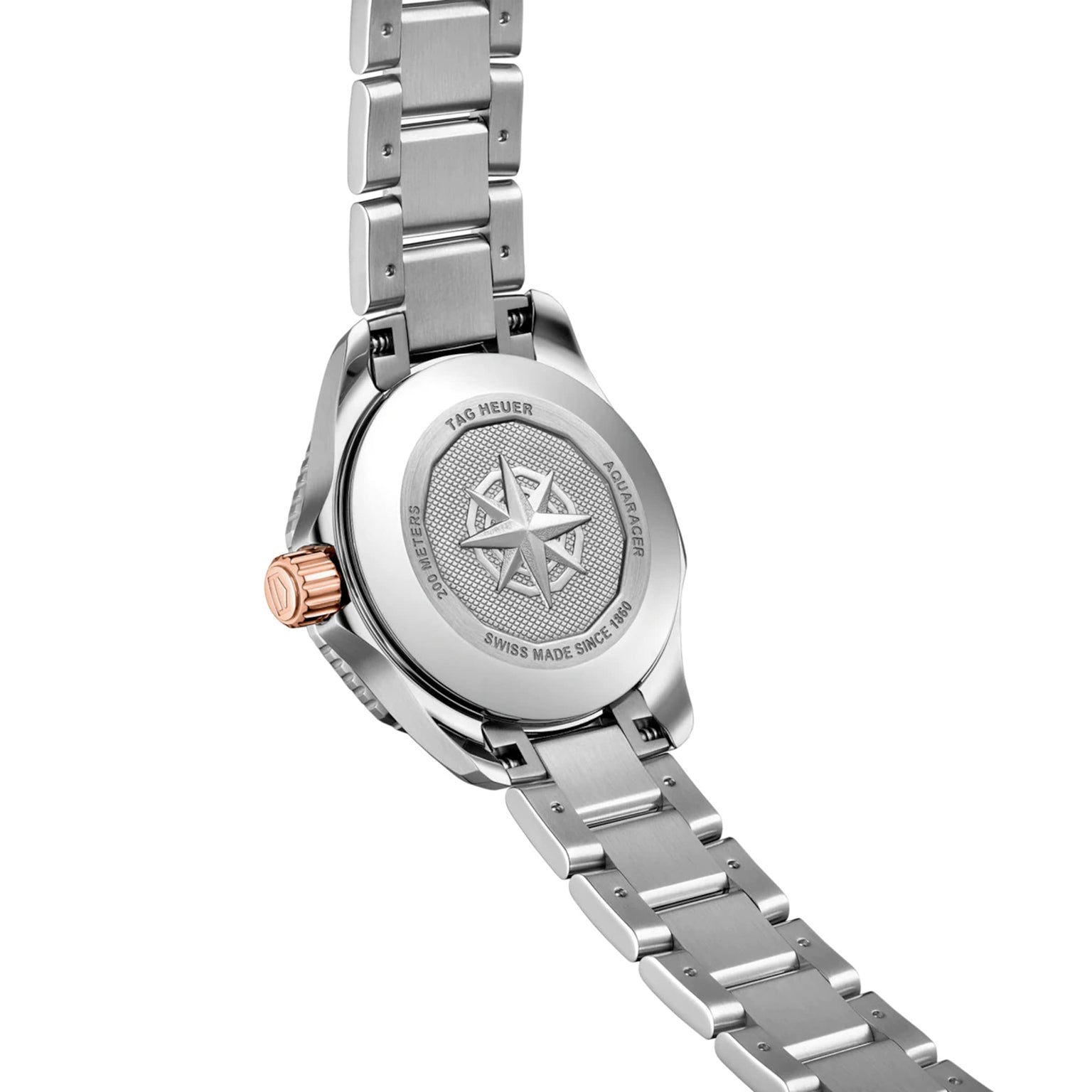 The back of a TAG Heuer Aquaracer Professional 200 features a stainless steel case, metal bracelet, rose gold crown, and an engraved compass design on the case back.
