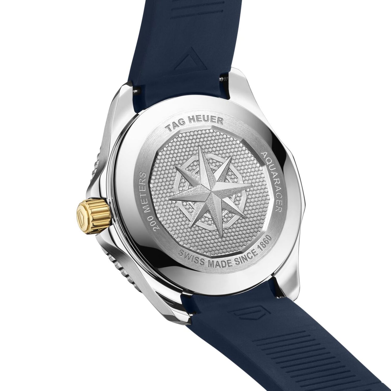 Close-up of the TAG Heuer Aquaracer Professional 200 Dates caseback with a blue strap, engraved compass motif, and text showing 200m water resistance and Swiss made heritage since 1860.