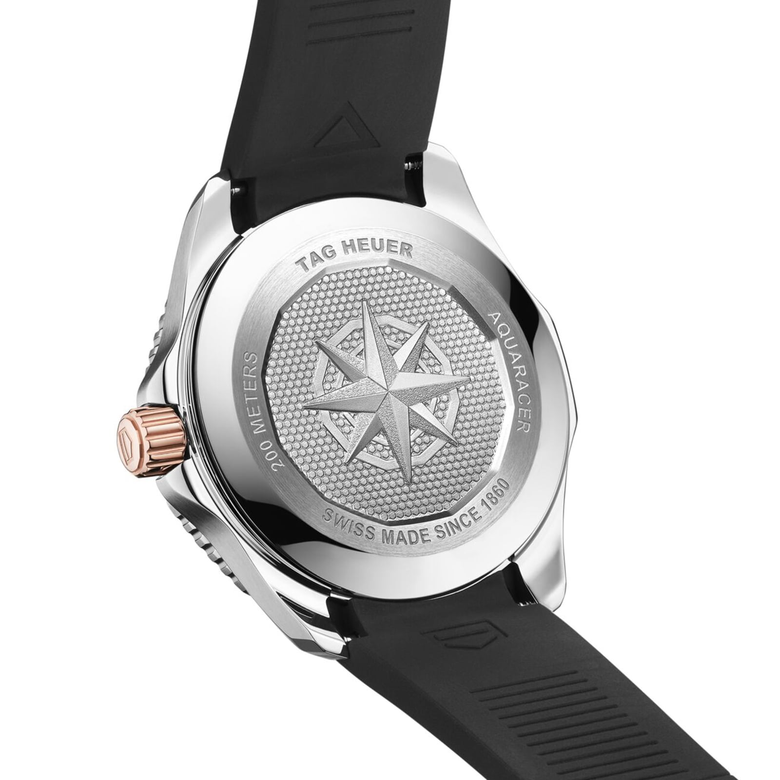 Close-up of the TAG Heuer Aquaracer Professional 200’s back, featuring a compass rose engraving and text highlighting its water resistance, Swiss origin, and Calibre 5 automatic movement.