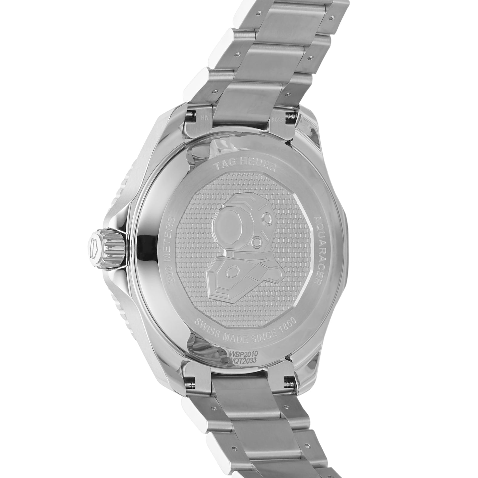 The image shows the back of a TAG Heuer Aquaracer Professional 300 GMT sports watch in stainless steel, featuring an engraved diving helmet and various inscriptions.